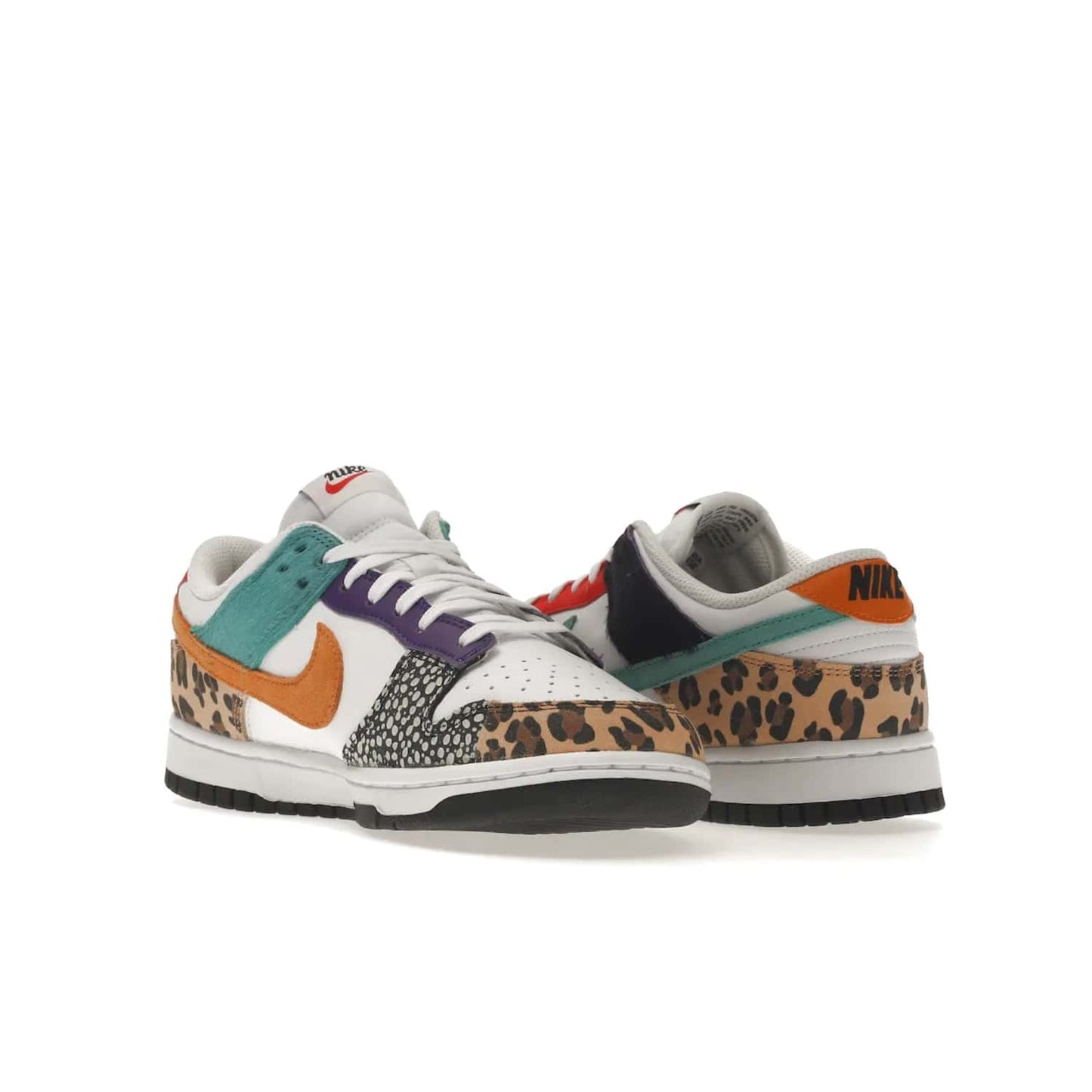 Nike Dunk Low Safari Mix (Women's) - Image 24 - Only at www.BallersClubKickz.com - Express your unique style with the Women’s Nike Dunk Low Safari Mix. Featuring a vibrant mix of white leather, leopard Durabuck, faux-horsehair, suede, and more, this stylish sneaker will turn heads. Shop now for a bold look at an affordable $120 price tag. Available in May 2022.