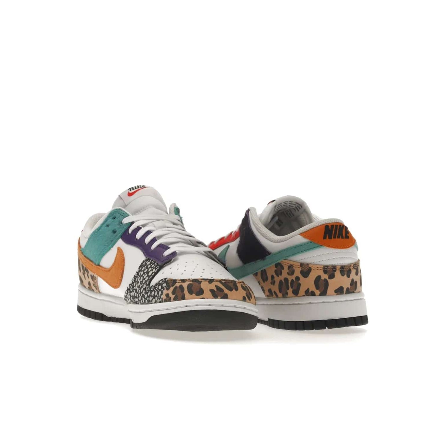 Nike Dunk Low Safari Mix (Women's) - Image 25 - Only at www.BallersClubKickz.com - Express your unique style with the Women’s Nike Dunk Low Safari Mix. Featuring a vibrant mix of white leather, leopard Durabuck, faux-horsehair, suede, and more, this stylish sneaker will turn heads. Shop now for a bold look at an affordable $120 price tag. Available in May 2022.