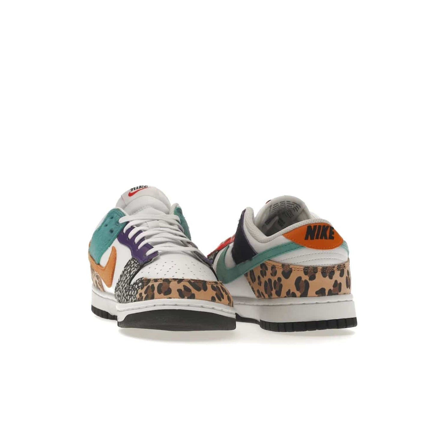 Nike Dunk Low Safari Mix (Women's) - Image 26 - Only at www.BallersClubKickz.com - Express your unique style with the Women’s Nike Dunk Low Safari Mix. Featuring a vibrant mix of white leather, leopard Durabuck, faux-horsehair, suede, and more, this stylish sneaker will turn heads. Shop now for a bold look at an affordable $120 price tag. Available in May 2022.