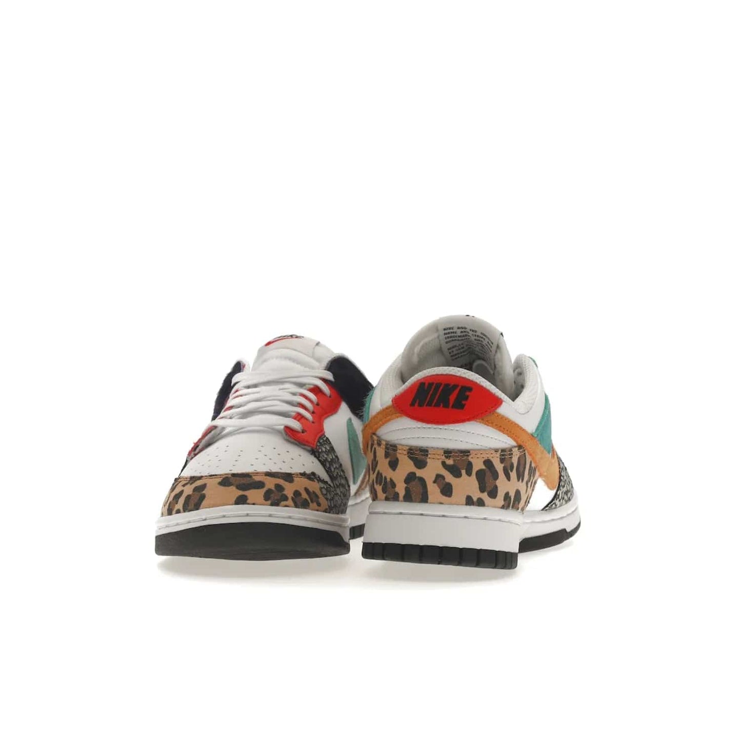 Nike Dunk Low Safari Mix (Women's) - Image 11 - Only at www.BallersClubKickz.com - Express your unique style with the Women’s Nike Dunk Low Safari Mix. Featuring a vibrant mix of white leather, leopard Durabuck, faux-horsehair, suede, and more, this stylish sneaker will turn heads. Shop now for a bold look at an affordable $120 price tag. Available in May 2022.