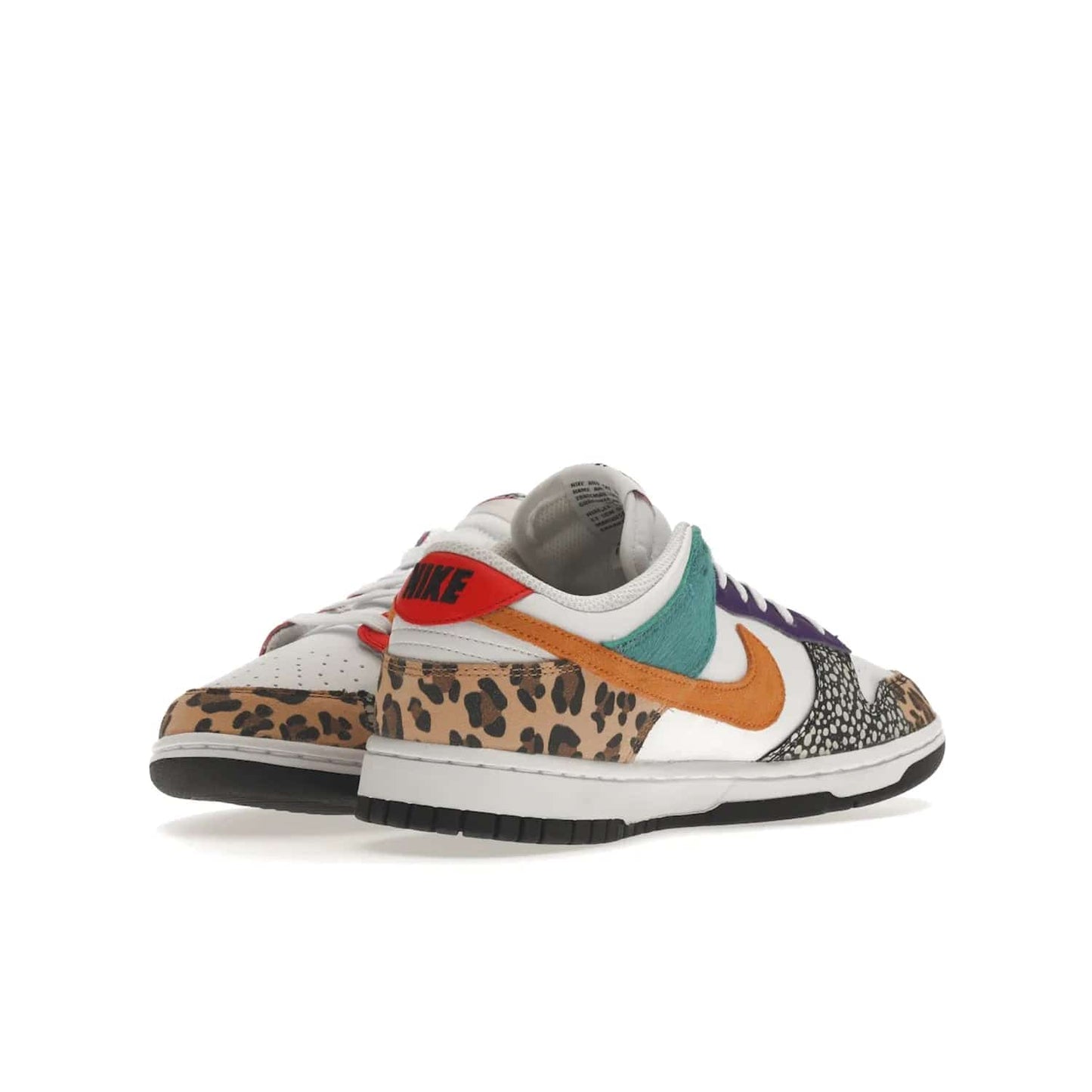 Nike Dunk Low Safari Mix (Women's) - Image 14 - Only at www.BallersClubKickz.com - Express your unique style with the Women’s Nike Dunk Low Safari Mix. Featuring a vibrant mix of white leather, leopard Durabuck, faux-horsehair, suede, and more, this stylish sneaker will turn heads. Shop now for a bold look at an affordable $120 price tag. Available in May 2022.