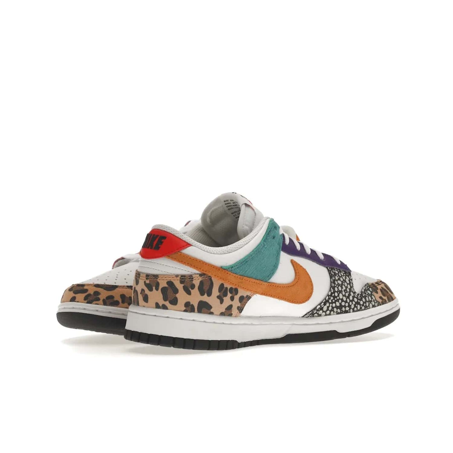 Nike Dunk Low Safari Mix (Women's) - Image 15 - Only at www.BallersClubKickz.com - Express your unique style with the Women’s Nike Dunk Low Safari Mix. Featuring a vibrant mix of white leather, leopard Durabuck, faux-horsehair, suede, and more, this stylish sneaker will turn heads. Shop now for a bold look at an affordable $120 price tag. Available in May 2022.