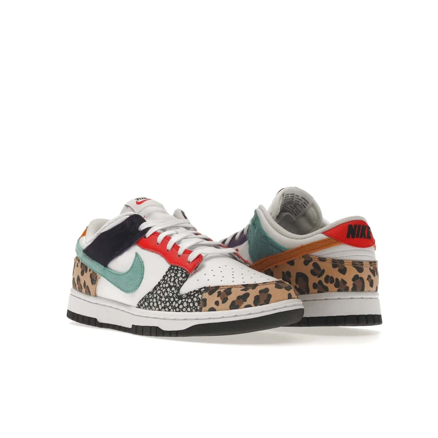 Nike Dunk Low Safari Mix (Women's) - Image 6 - Only at www.BallersClubKickz.com - Express your unique style with the Women’s Nike Dunk Low Safari Mix. Featuring a vibrant mix of white leather, leopard Durabuck, faux-horsehair, suede, and more, this stylish sneaker will turn heads. Shop now for a bold look at an affordable $120 price tag. Available in May 2022.