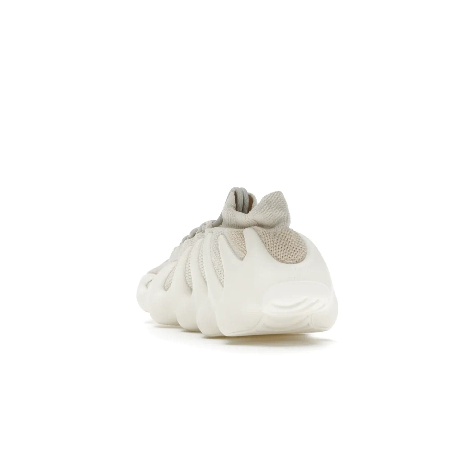 adidas Yeezy 450 Cloud White - Image 26 - Only at www.BallersClubKickz.com - Experience the future with the adidas Yeezy 450 Cloud White. A two-piece design featuring an extreme foam sole and mesh upper, this silhouette is expected to release in March 2021. Get your hands on this striking Cloud White/Cloud White colorway and stand out in the crowd.