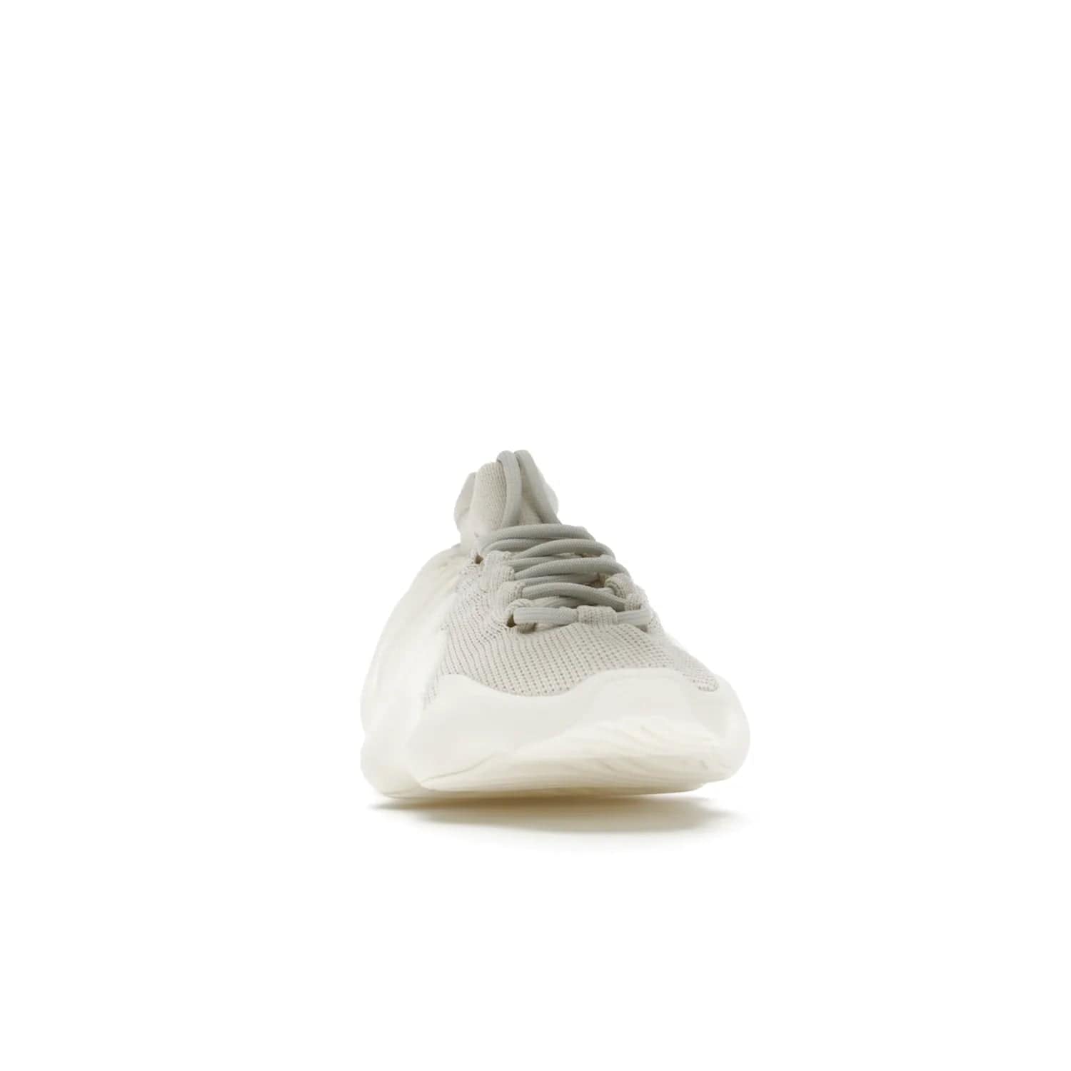 adidas Yeezy 450 Cloud White - Image 9 - Only at www.BallersClubKickz.com - Experience the future with the adidas Yeezy 450 Cloud White. A two-piece design featuring an extreme foam sole and mesh upper, this silhouette is expected to release in March 2021. Get your hands on this striking Cloud White/Cloud White colorway and stand out in the crowd.