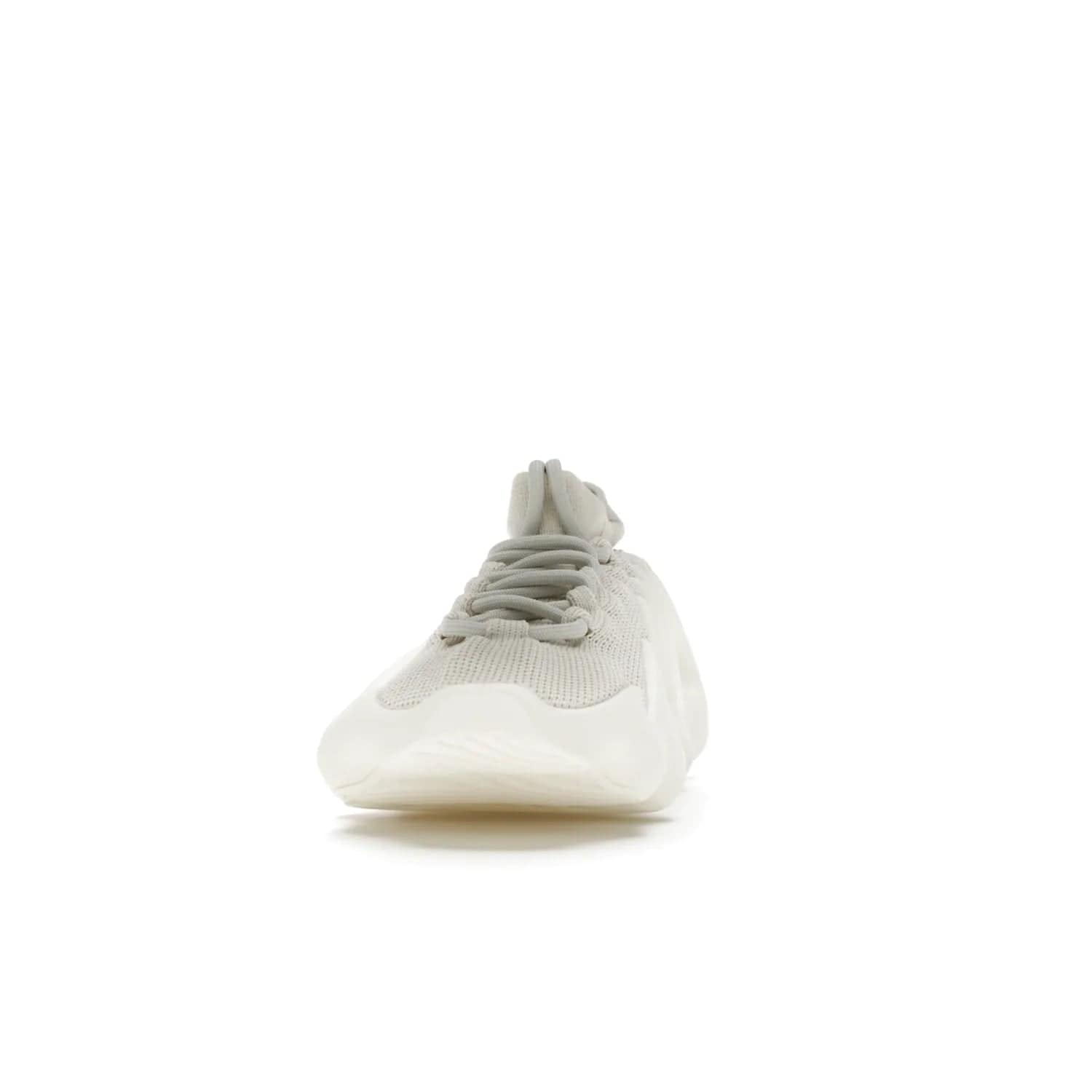 adidas Yeezy 450 Cloud White - Image 11 - Only at www.BallersClubKickz.com - Experience the future with the adidas Yeezy 450 Cloud White. A two-piece design featuring an extreme foam sole and mesh upper, this silhouette is expected to release in March 2021. Get your hands on this striking Cloud White/Cloud White colorway and stand out in the crowd.