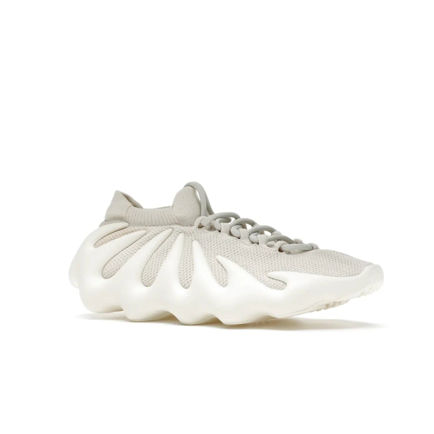 adidas Yeezy 450 Cloud White - Image 4 - Only at www.BallersClubKickz.com - Experience the future with the adidas Yeezy 450 Cloud White. A two-piece design featuring an extreme foam sole and mesh upper, this silhouette is expected to release in March 2021. Get your hands on this striking Cloud White/Cloud White colorway and stand out in the crowd.