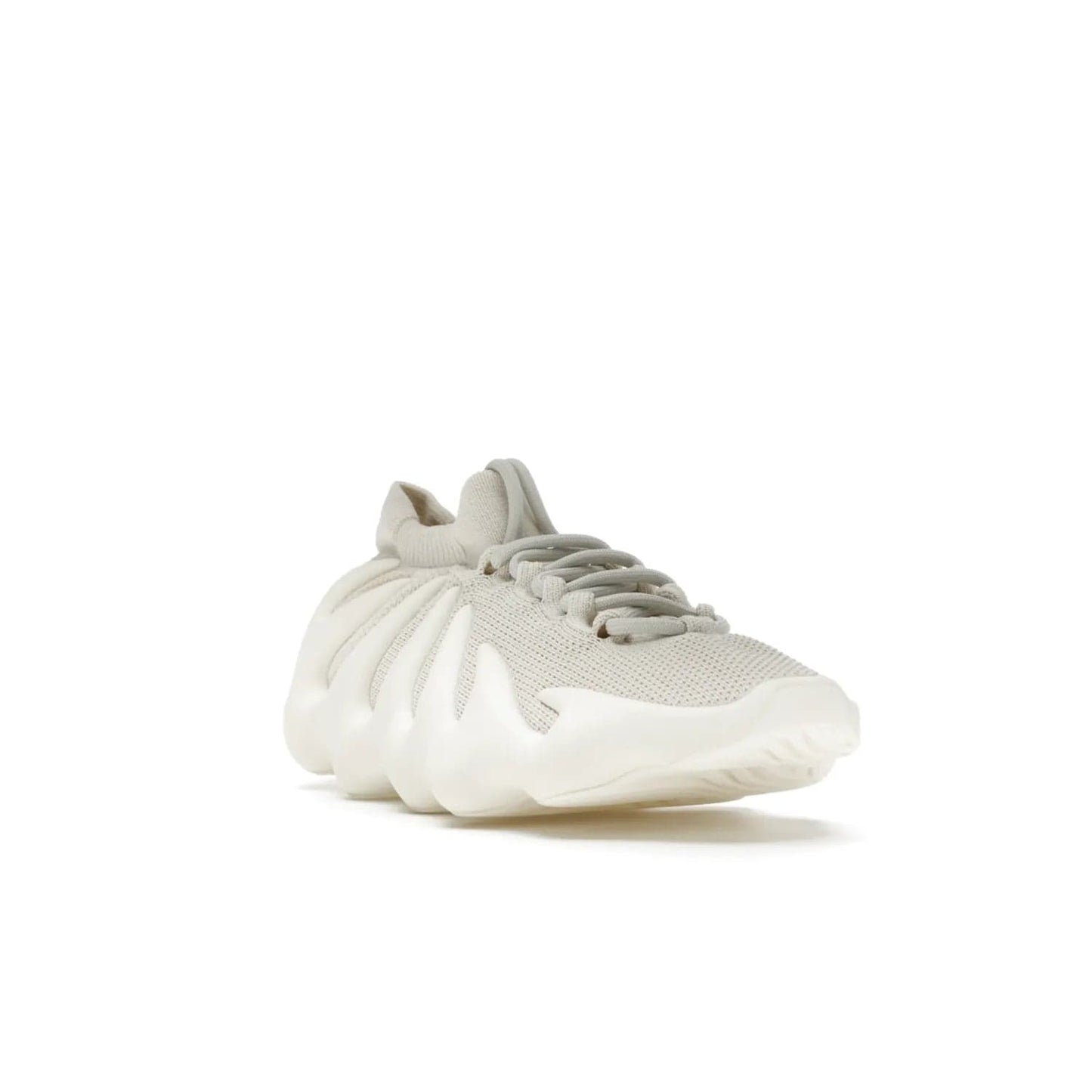 adidas Yeezy 450 Cloud White - Image 7 - Only at www.BallersClubKickz.com - Experience the future with the adidas Yeezy 450 Cloud White. A two-piece design featuring an extreme foam sole and mesh upper, this silhouette is expected to release in March 2021. Get your hands on this striking Cloud White/Cloud White colorway and stand out in the crowd.