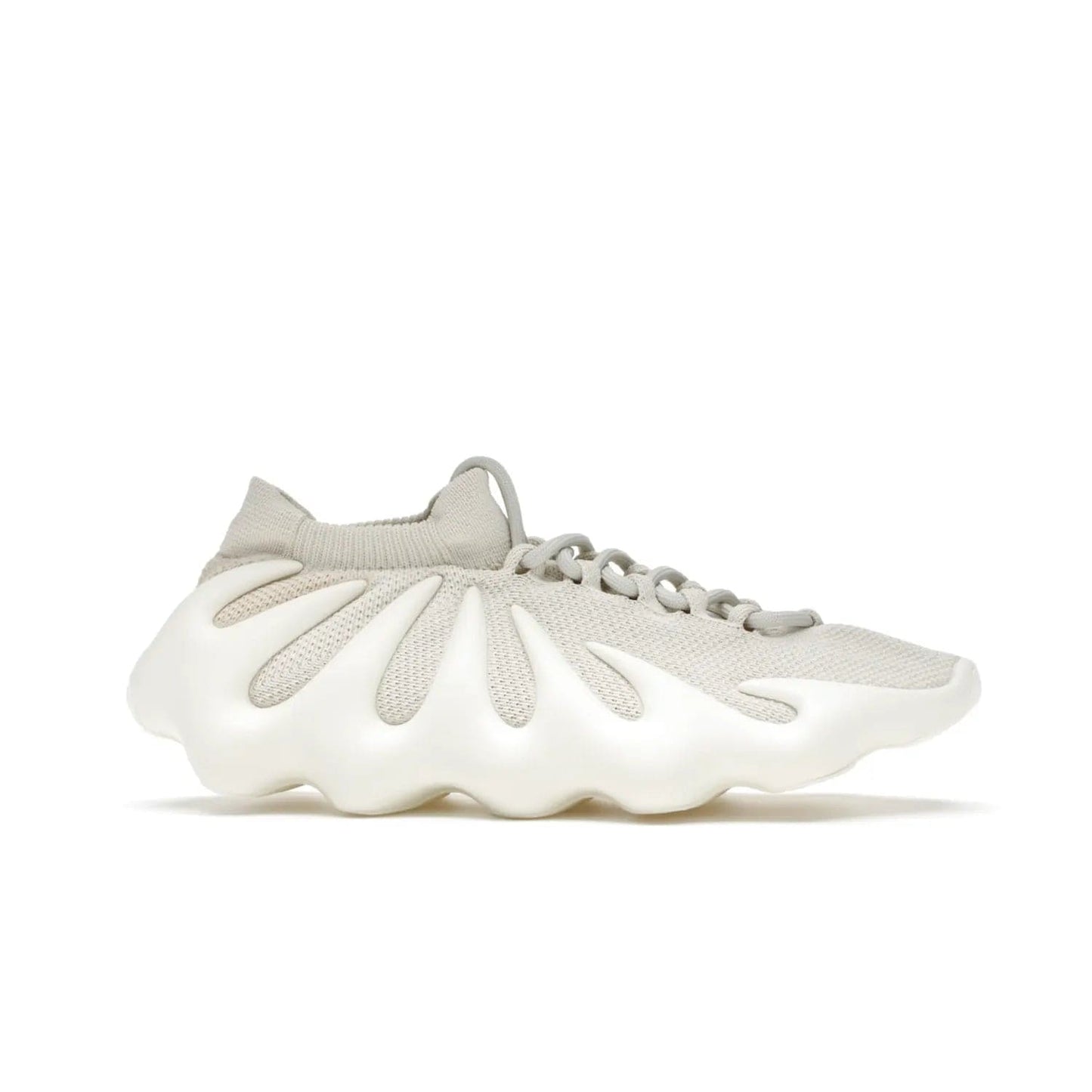 adidas Yeezy 450 Cloud White - Image 2 - Only at www.BallersClubKickz.com - Experience the future with the adidas Yeezy 450 Cloud White. A two-piece design featuring an extreme foam sole and mesh upper, this silhouette is expected to release in March 2021. Get your hands on this striking Cloud White/Cloud White colorway and stand out in the crowd.