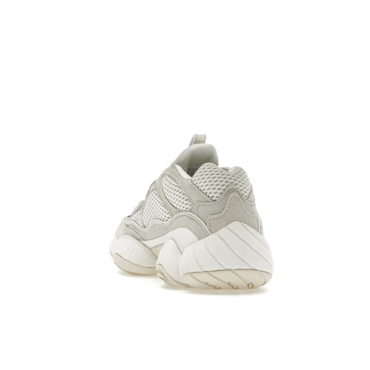 adidas Yeezy 500 Bone White (2023) - Image 26 - Only at www.BallersClubKickz.com - Experience the unique style of the adidas Yeezy 500 Bone White. Featuring a Bone White colorway and white accents, durable construction and comfortably light feel. Get ready to make a statement in 2023.