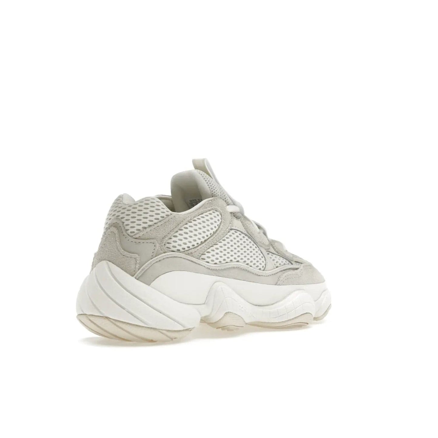 adidas Yeezy 500 Bone White (2023) - Image 32 - Only at www.BallersClubKickz.com - Experience the unique style of the adidas Yeezy 500 Bone White. Featuring a Bone White colorway and white accents, durable construction and comfortably light feel. Get ready to make a statement in 2023.