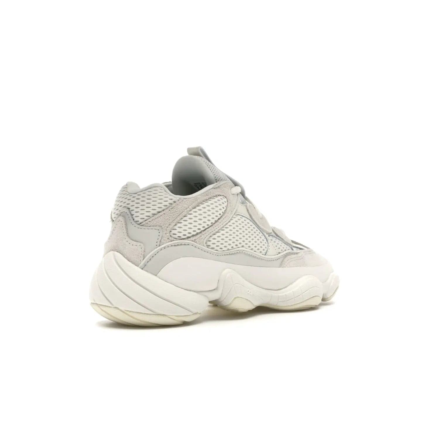 adidas Yeezy 500 Bone White - Image 32 - Only at www.BallersClubKickz.com - Classic look perfect for any sneaker collection. The adidas Yeezy 500 "Bone White" blends a white mesh upper with suede overlays & a chunky midsole inspired by the Adidas KB3. Complimented by a tonal-cream outsole, this timeless style is a must-have.