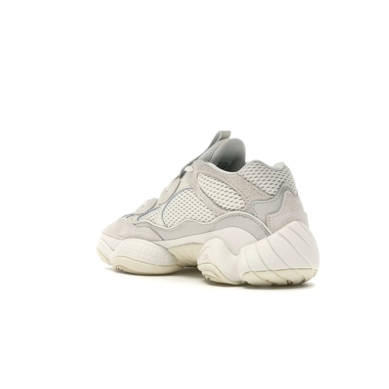 adidas Yeezy 500 Bone White - Image 24 - Only at www.BallersClubKickz.com - Classic look perfect for any sneaker collection. The adidas Yeezy 500 "Bone White" blends a white mesh upper with suede overlays & a chunky midsole inspired by the Adidas KB3. Complimented by a tonal-cream outsole, this timeless style is a must-have.