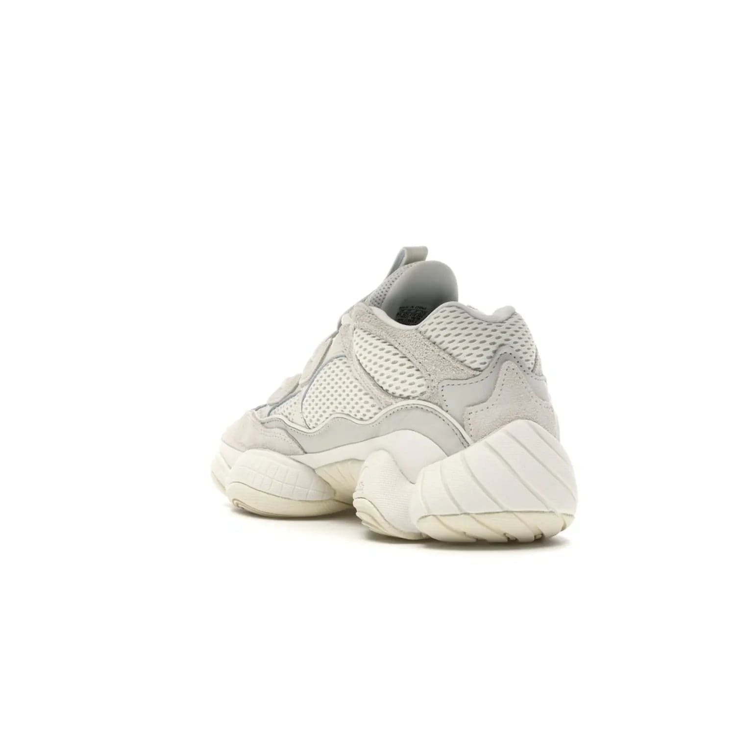 adidas Yeezy 500 Bone White - Image 25 - Only at www.BallersClubKickz.com - Classic look perfect for any sneaker collection. The adidas Yeezy 500 "Bone White" blends a white mesh upper with suede overlays & a chunky midsole inspired by the Adidas KB3. Complimented by a tonal-cream outsole, this timeless style is a must-have.