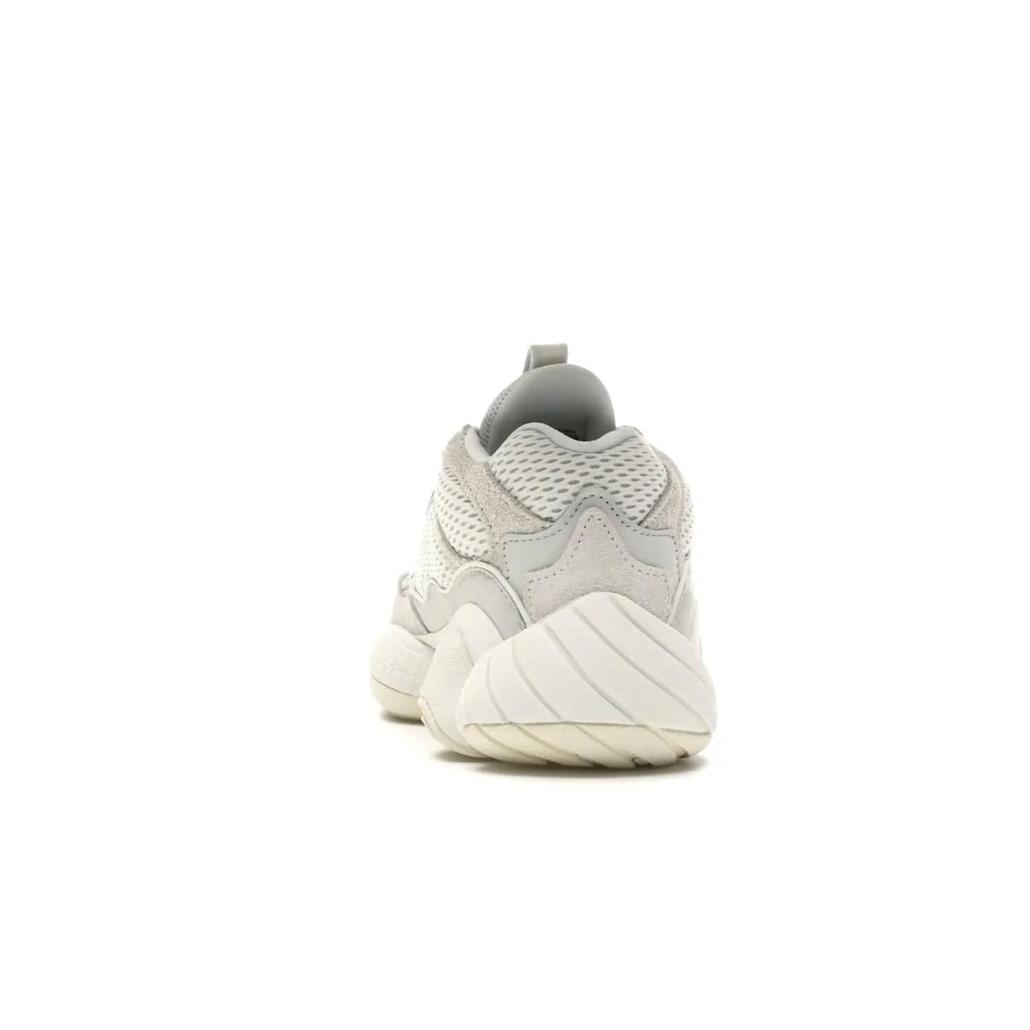 adidas Yeezy 500 Bone White - Image 27 - Only at www.BallersClubKickz.com - Classic look perfect for any sneaker collection. The adidas Yeezy 500 "Bone White" blends a white mesh upper with suede overlays & a chunky midsole inspired by the Adidas KB3. Complimented by a tonal-cream outsole, this timeless style is a must-have.