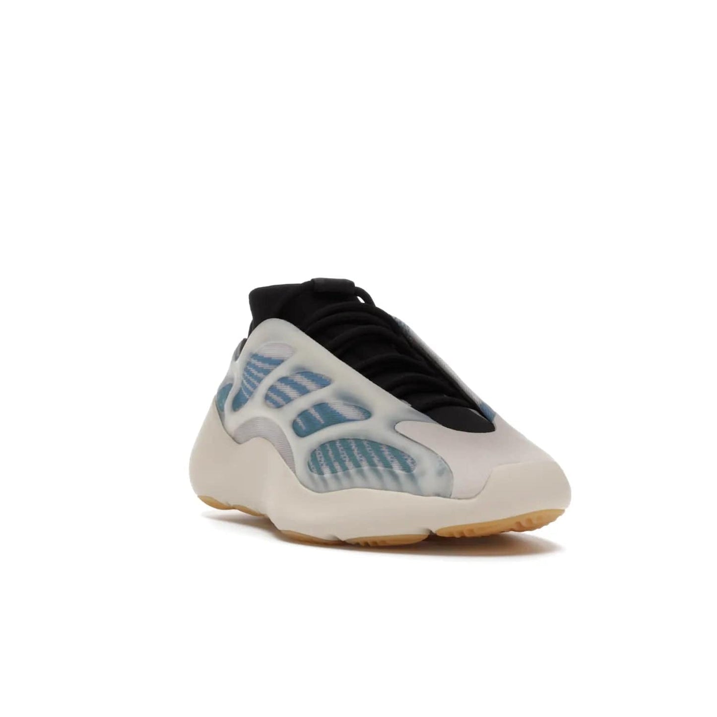 adidas Yeezy 700 V3 Kyanite - Image 7 - Only at www.BallersClubKickz.com - The adidas Yeezy 700 V3 Kyanite offers a layered design featuring a glow-in-the-dark TPU cage and a tonal cream-colored EVA foam midsole. With its herringbone-patterned outsole, the style and comfort of the sneaker will accompany you anywhere. Released in March 2021, it's a great addition to any sneaker wardrobe.
