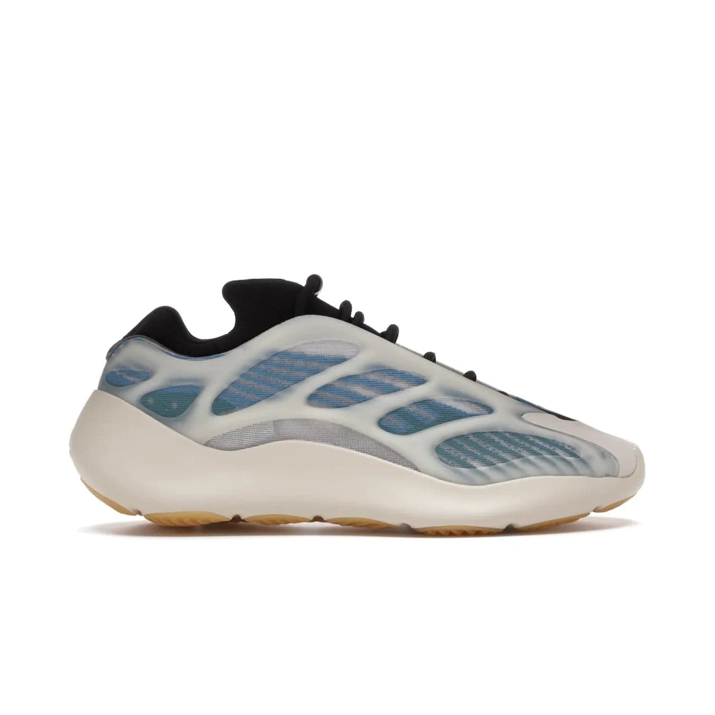 adidas Yeezy 700 V3 Kyanite - Image 1 - Only at www.BallersClubKickz.com - The adidas Yeezy 700 V3 Kyanite offers a layered design featuring a glow-in-the-dark TPU cage and a tonal cream-colored EVA foam midsole. With its herringbone-patterned outsole, the style and comfort of the sneaker will accompany you anywhere. Released in March 2021, it's a great addition to any sneaker wardrobe.