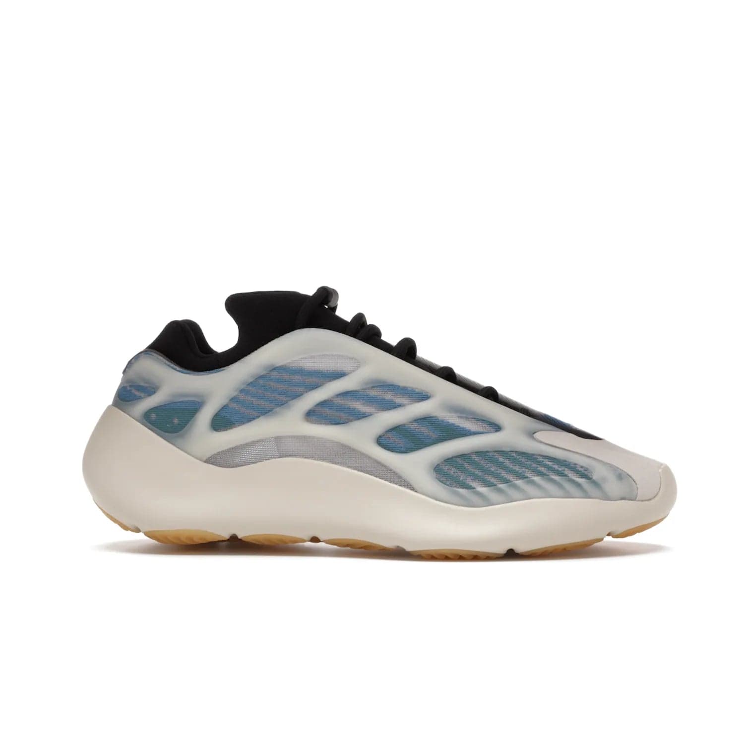 adidas Yeezy 700 V3 Kyanite - Image 2 - Only at www.BallersClubKickz.com - The adidas Yeezy 700 V3 Kyanite offers a layered design featuring a glow-in-the-dark TPU cage and a tonal cream-colored EVA foam midsole. With its herringbone-patterned outsole, the style and comfort of the sneaker will accompany you anywhere. Released in March 2021, it's a great addition to any sneaker wardrobe.