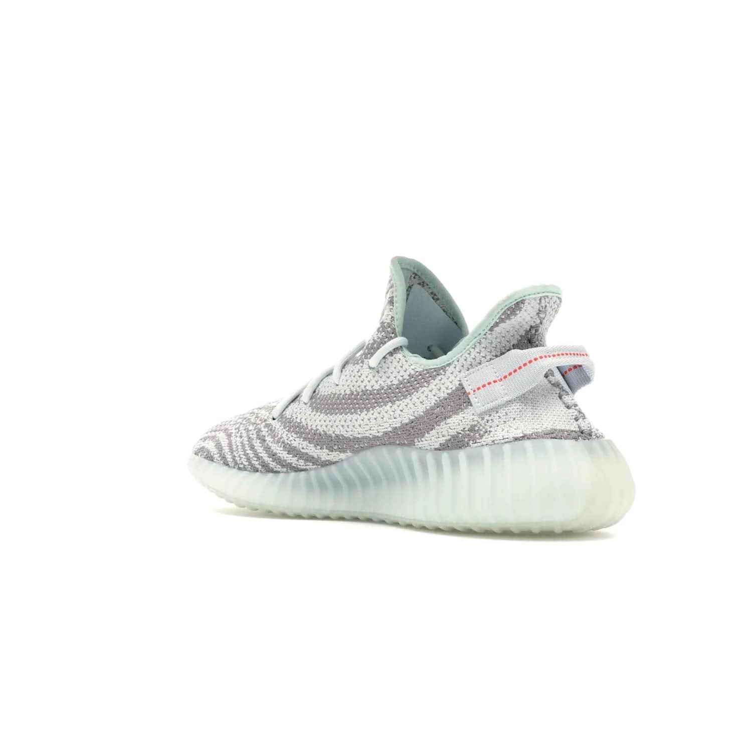 adidas Yeezy Boost 350 V2 Blue Tint - Image 24 - Only at www.BallersClubKickz.com - The adidas Yeezy Boost 350 V2 Blue Tint merges fashion and functionality with its Primeknit upper and Boost sole. Released in December 2017, this luxurious sneaker is perfect for making a stylish statement.