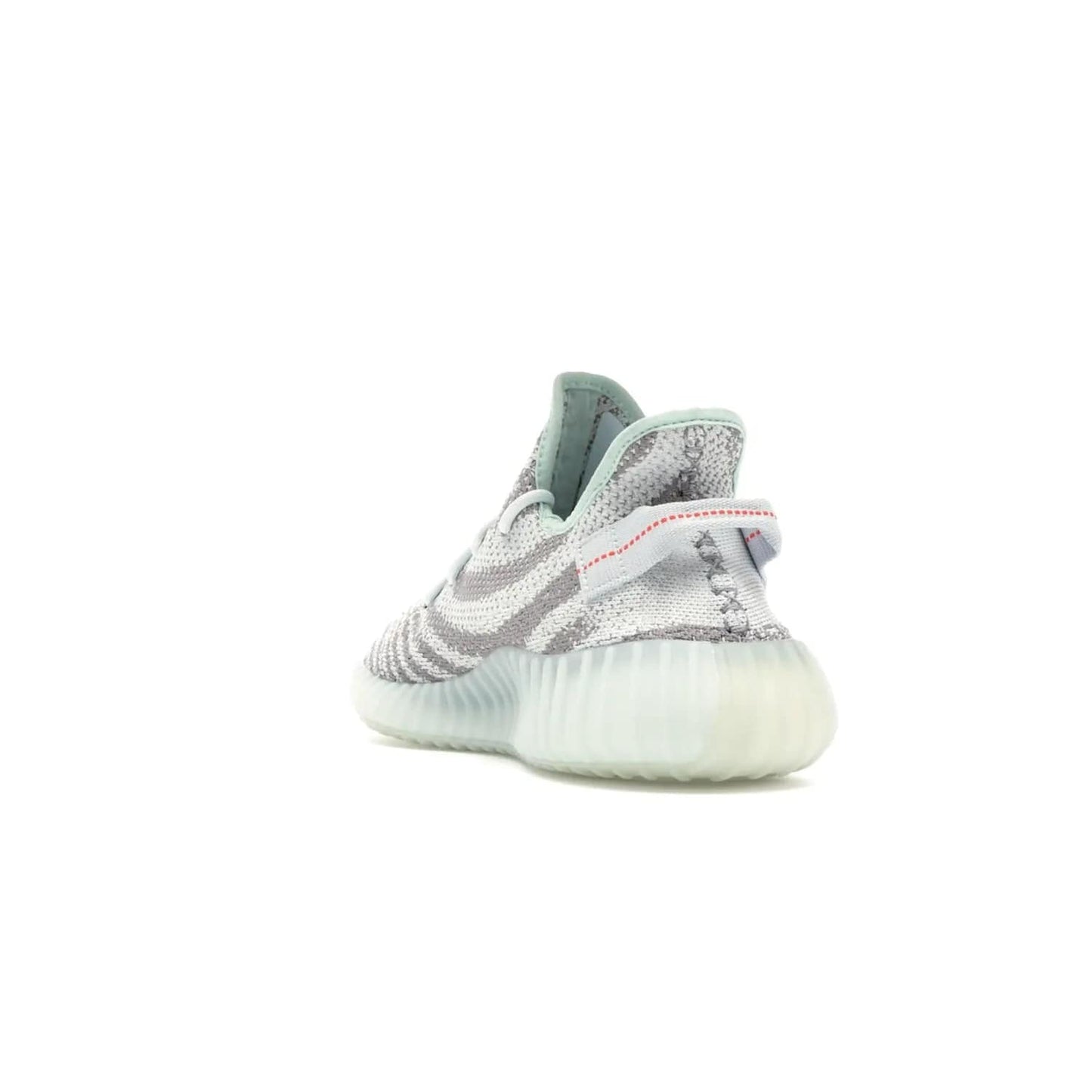 adidas Yeezy Boost 350 V2 Blue Tint - Image 26 - Only at www.BallersClubKickz.com - The adidas Yeezy Boost 350 V2 Blue Tint merges fashion and functionality with its Primeknit upper and Boost sole. Released in December 2017, this luxurious sneaker is perfect for making a stylish statement.