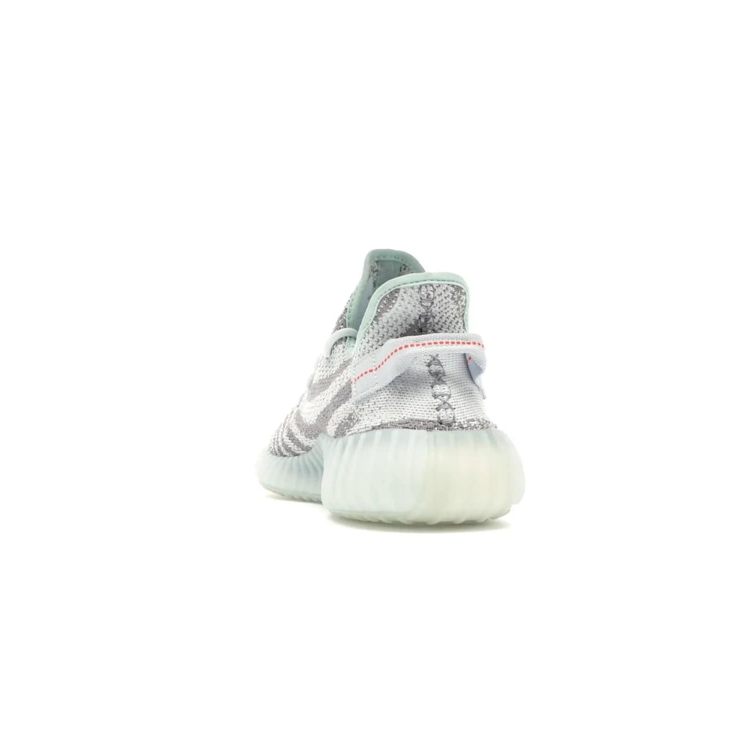 adidas Yeezy Boost 350 V2 Blue Tint - Image 27 - Only at www.BallersClubKickz.com - The adidas Yeezy Boost 350 V2 Blue Tint merges fashion and functionality with its Primeknit upper and Boost sole. Released in December 2017, this luxurious sneaker is perfect for making a stylish statement.