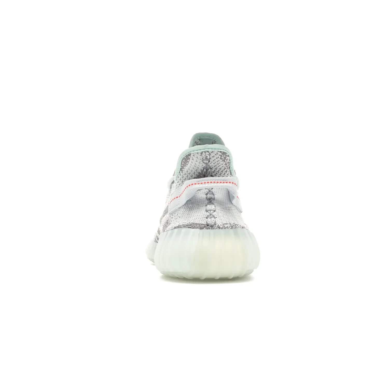 adidas Yeezy Boost 350 V2 Blue Tint - Image 28 - Only at www.BallersClubKickz.com - The adidas Yeezy Boost 350 V2 Blue Tint merges fashion and functionality with its Primeknit upper and Boost sole. Released in December 2017, this luxurious sneaker is perfect for making a stylish statement.