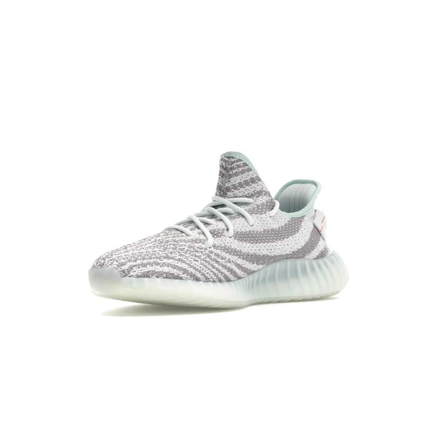 adidas Yeezy Boost 350 V2 Blue Tint - Image 15 - Only at www.BallersClubKickz.com - The adidas Yeezy Boost 350 V2 Blue Tint merges fashion and functionality with its Primeknit upper and Boost sole. Released in December 2017, this luxurious sneaker is perfect for making a stylish statement.