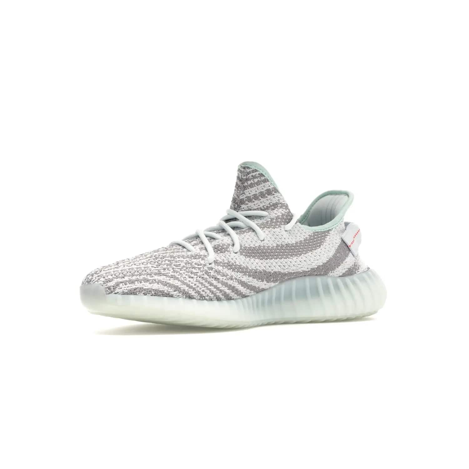 adidas Yeezy Boost 350 V2 Blue Tint - Image 16 - Only at www.BallersClubKickz.com - The adidas Yeezy Boost 350 V2 Blue Tint merges fashion and functionality with its Primeknit upper and Boost sole. Released in December 2017, this luxurious sneaker is perfect for making a stylish statement.