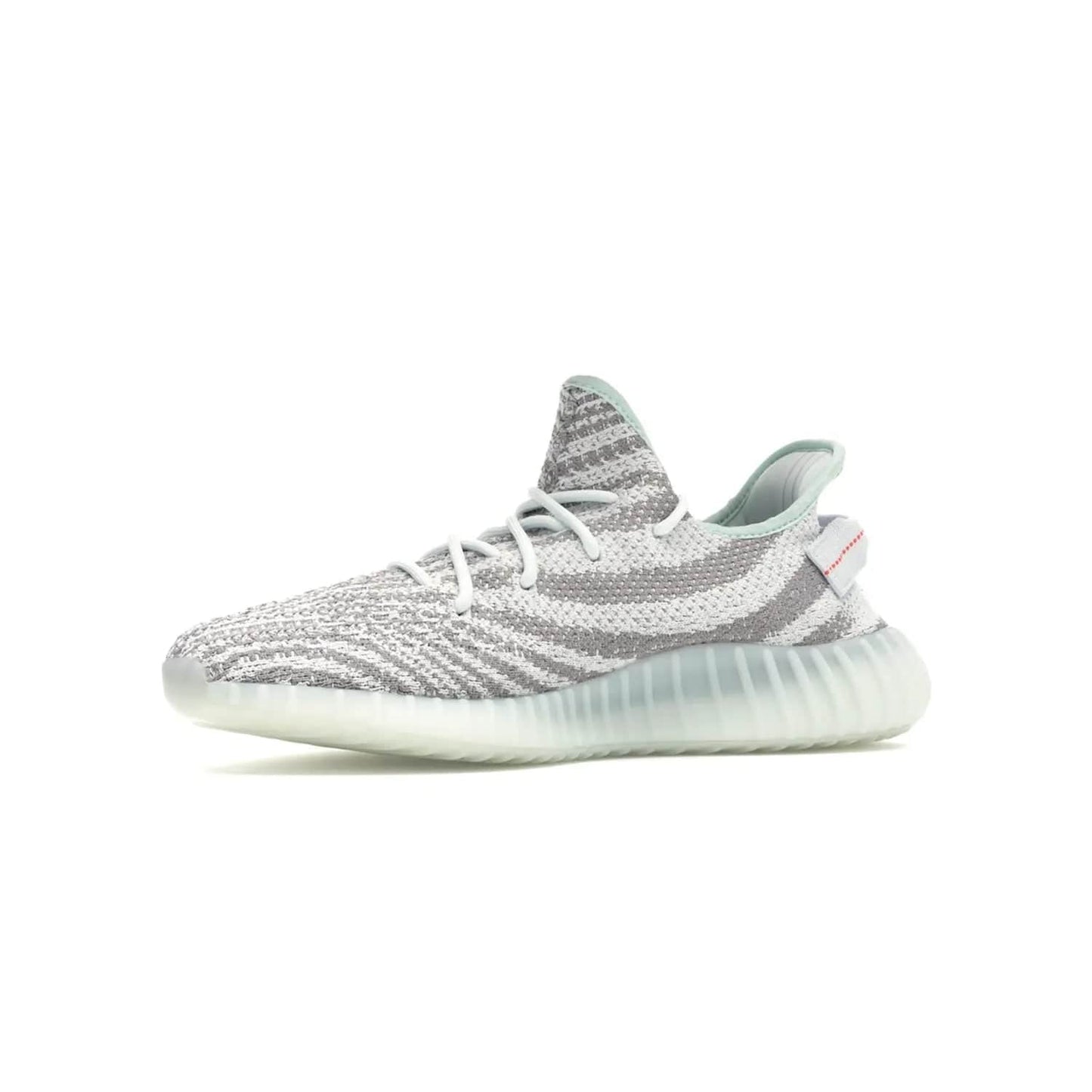 adidas Yeezy Boost 350 V2 Blue Tint - Image 17 - Only at www.BallersClubKickz.com - The adidas Yeezy Boost 350 V2 Blue Tint merges fashion and functionality with its Primeknit upper and Boost sole. Released in December 2017, this luxurious sneaker is perfect for making a stylish statement.