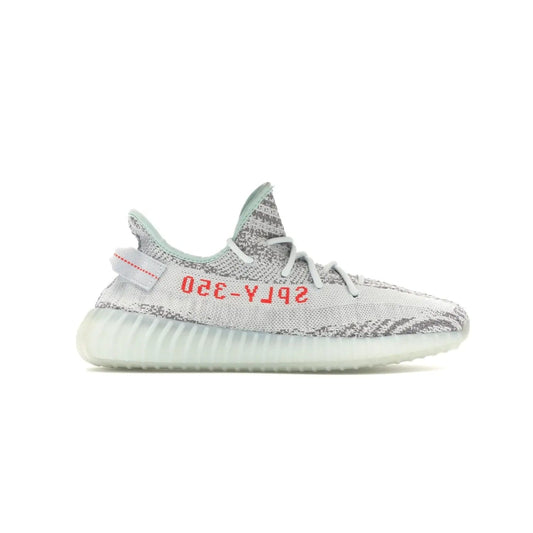adidas Yeezy Boost 350 V2 Blue Tint - Image 1 - Only at www.BallersClubKickz.com - The adidas Yeezy Boost 350 V2 Blue Tint merges fashion and functionality with its Primeknit upper and Boost sole. Released in December 2017, this luxurious sneaker is perfect for making a stylish statement.