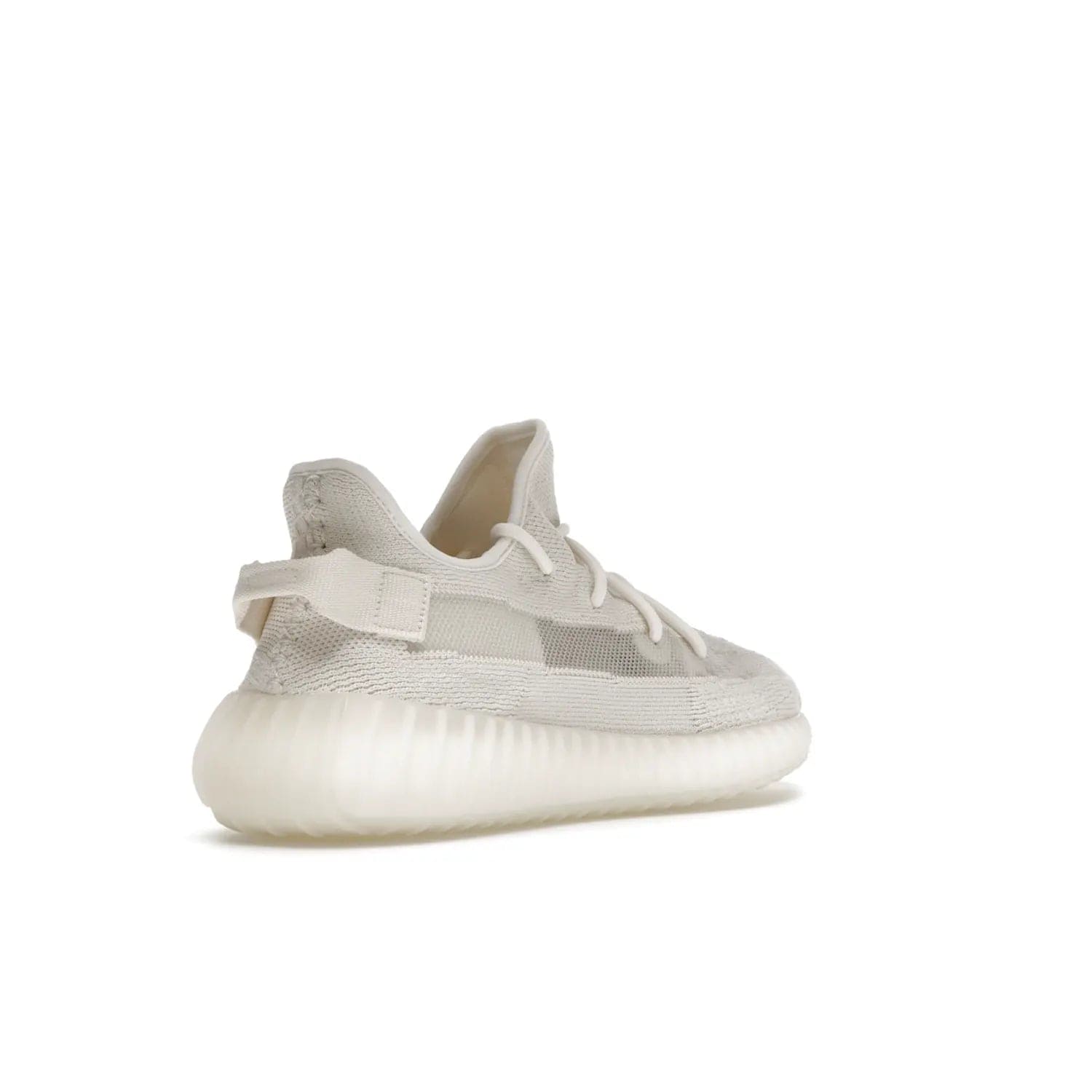 adidas Yeezy Boost 350 V2 Bone - Image 32 - Only at www.BallersClubKickz.com - Grab the stylish and comfortable adidas Yeezy Boost 350 V2 Bone in March 2022. This sneaker features a triple white Primeknit upper, mesh side stripes and canvas heel tabs, sitting atop a semi-translucent sole with Boost technology. Sure to keep your feet comfortable and stylish!
