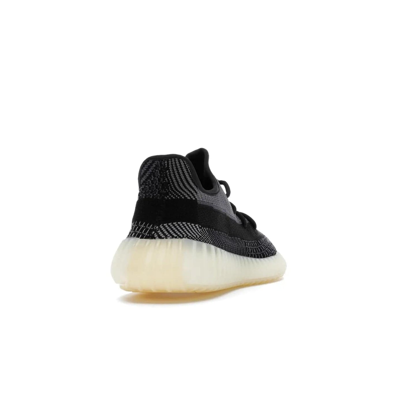 adidas Yeezy Boost 350 V2 Carbon - Image 30 - Only at www.BallersClubKickz.com - Introducing the adidas Yeezy Boost 350 V2 Carbon. Iconic sneaker with a dark-hued upper, breathable Primeknit mesh, signature side stripe, off-white midsole & BOOST cushioning. Perfect for any sneaker lover. Released October 2020.