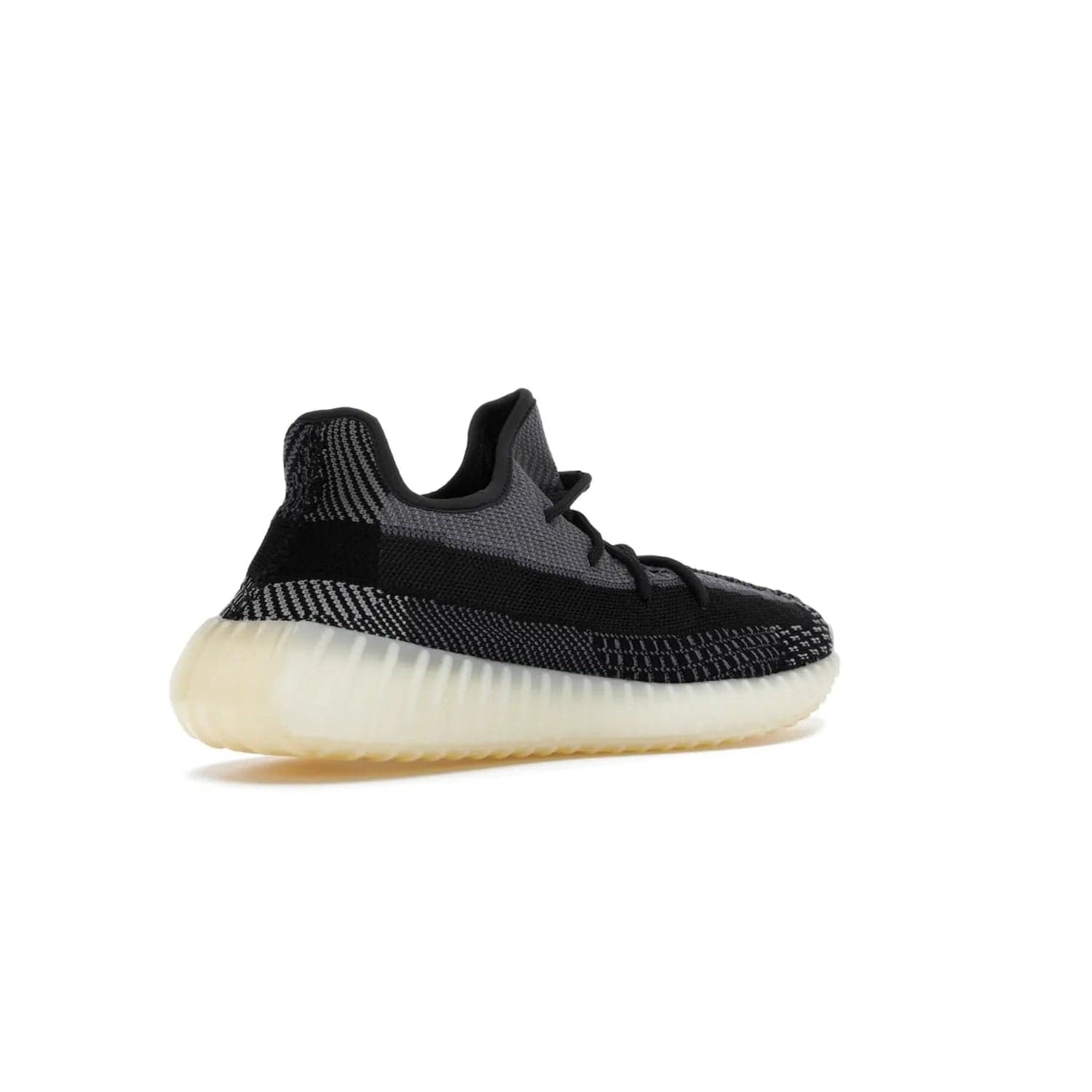 adidas Yeezy Boost 350 V2 Carbon - Image 33 - Only at www.BallersClubKickz.com - Introducing the adidas Yeezy Boost 350 V2 Carbon. Iconic sneaker with a dark-hued upper, breathable Primeknit mesh, signature side stripe, off-white midsole & BOOST cushioning. Perfect for any sneaker lover. Released October 2020.