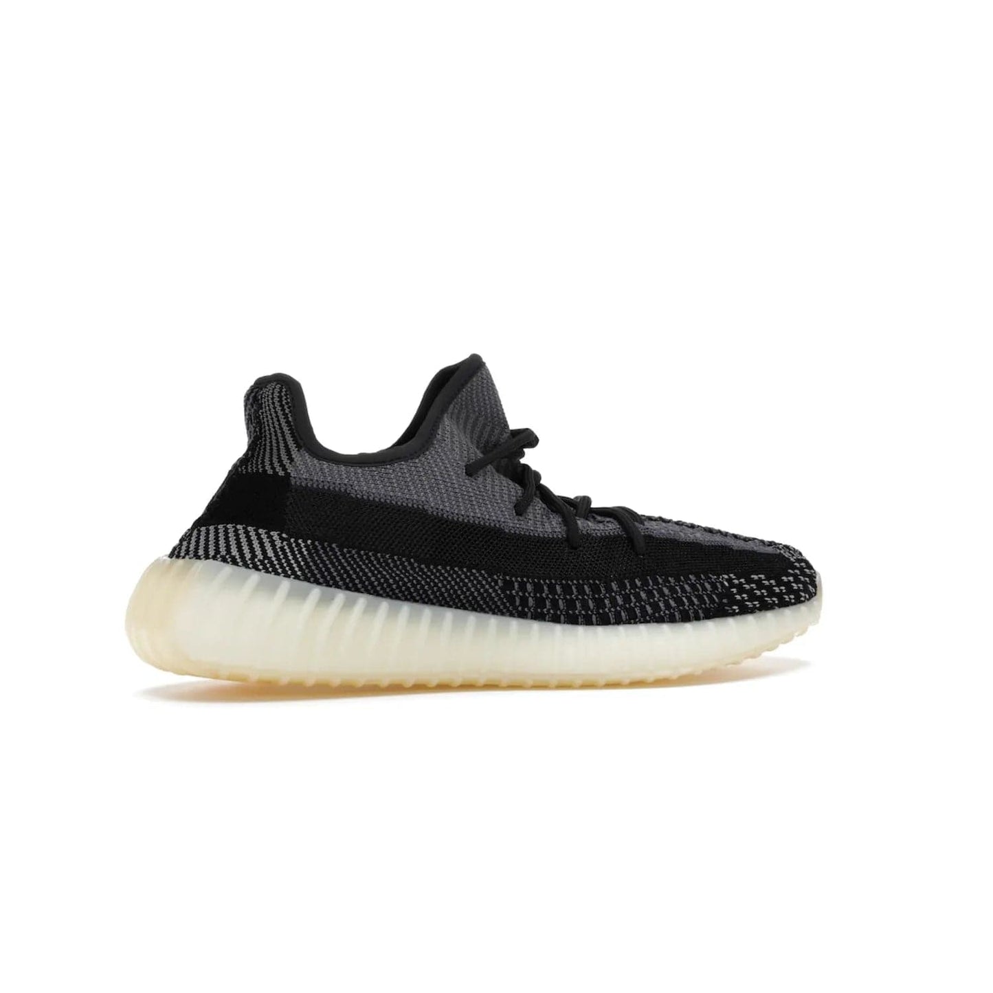 adidas Yeezy Boost 350 V2 Carbon - Image 35 - Only at www.BallersClubKickz.com - Introducing the adidas Yeezy Boost 350 V2 Carbon. Iconic sneaker with a dark-hued upper, breathable Primeknit mesh, signature side stripe, off-white midsole & BOOST cushioning. Perfect for any sneaker lover. Released October 2020.