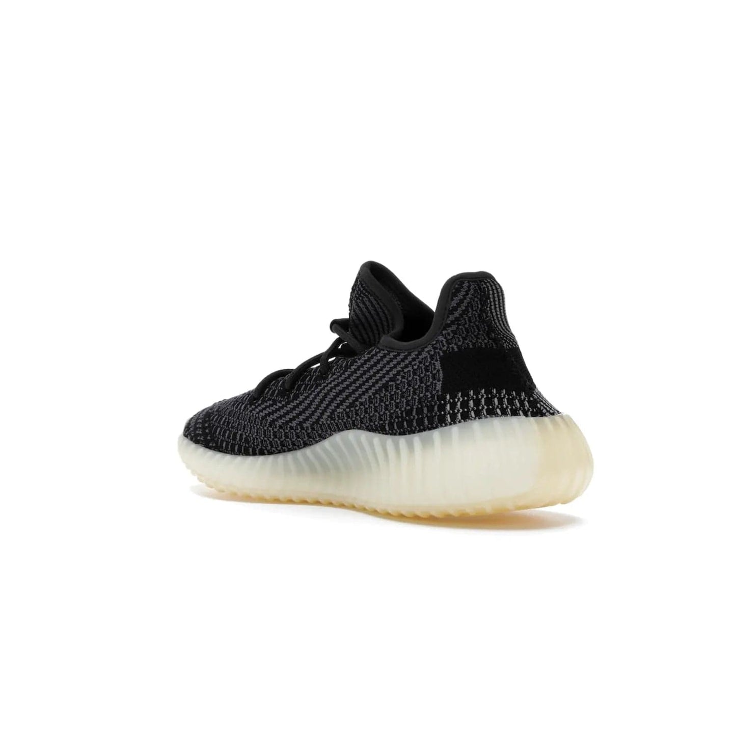 adidas Yeezy Boost 350 V2 Carbon - Image 24 - Only at www.BallersClubKickz.com - Introducing the adidas Yeezy Boost 350 V2 Carbon. Iconic sneaker with a dark-hued upper, breathable Primeknit mesh, signature side stripe, off-white midsole & BOOST cushioning. Perfect for any sneaker lover. Released October 2020.