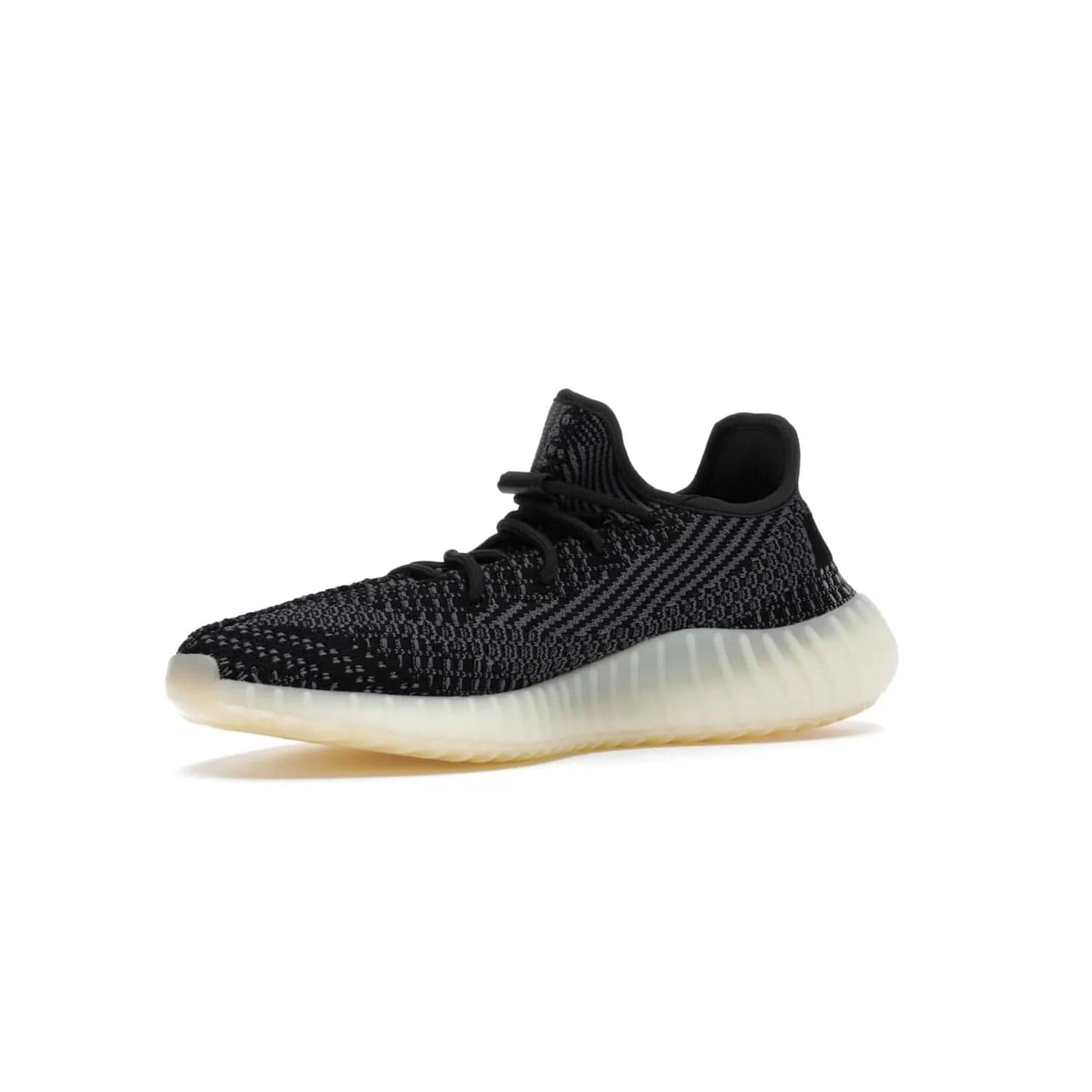adidas Yeezy Boost 350 V2 Carbon - Image 16 - Only at www.BallersClubKickz.com - Introducing the adidas Yeezy Boost 350 V2 Carbon. Iconic sneaker with a dark-hued upper, breathable Primeknit mesh, signature side stripe, off-white midsole & BOOST cushioning. Perfect for any sneaker lover. Released October 2020.