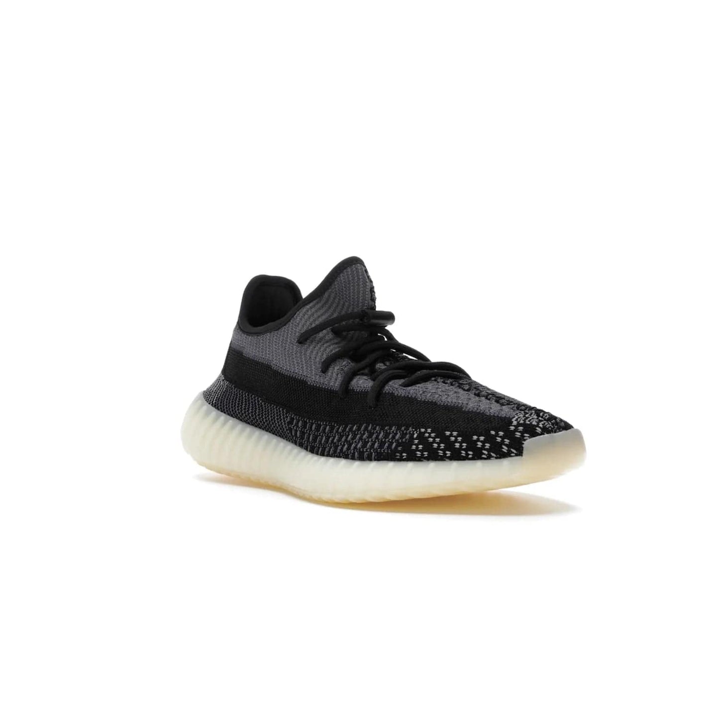 adidas Yeezy Boost 350 V2 Carbon - Image 6 - Only at www.BallersClubKickz.com - Introducing the adidas Yeezy Boost 350 V2 Carbon. Iconic sneaker with a dark-hued upper, breathable Primeknit mesh, signature side stripe, off-white midsole & BOOST cushioning. Perfect for any sneaker lover. Released October 2020.