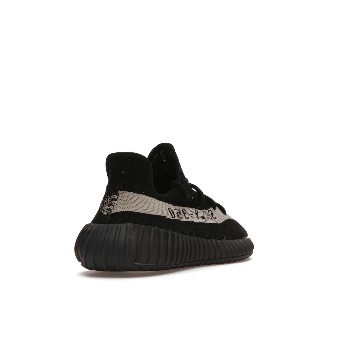 adidas Yeezy Boost 350 V2 Core Black White (2016/2022) - Image 31 - Only at www.BallersClubKickz.com - Stylish adidas Yeezy Boost 350 V2 in classic black with white "SPLY-350" stitched to the side stripe. Features Primeknit upper & Boost sole for comfort. Restock in March 2022.