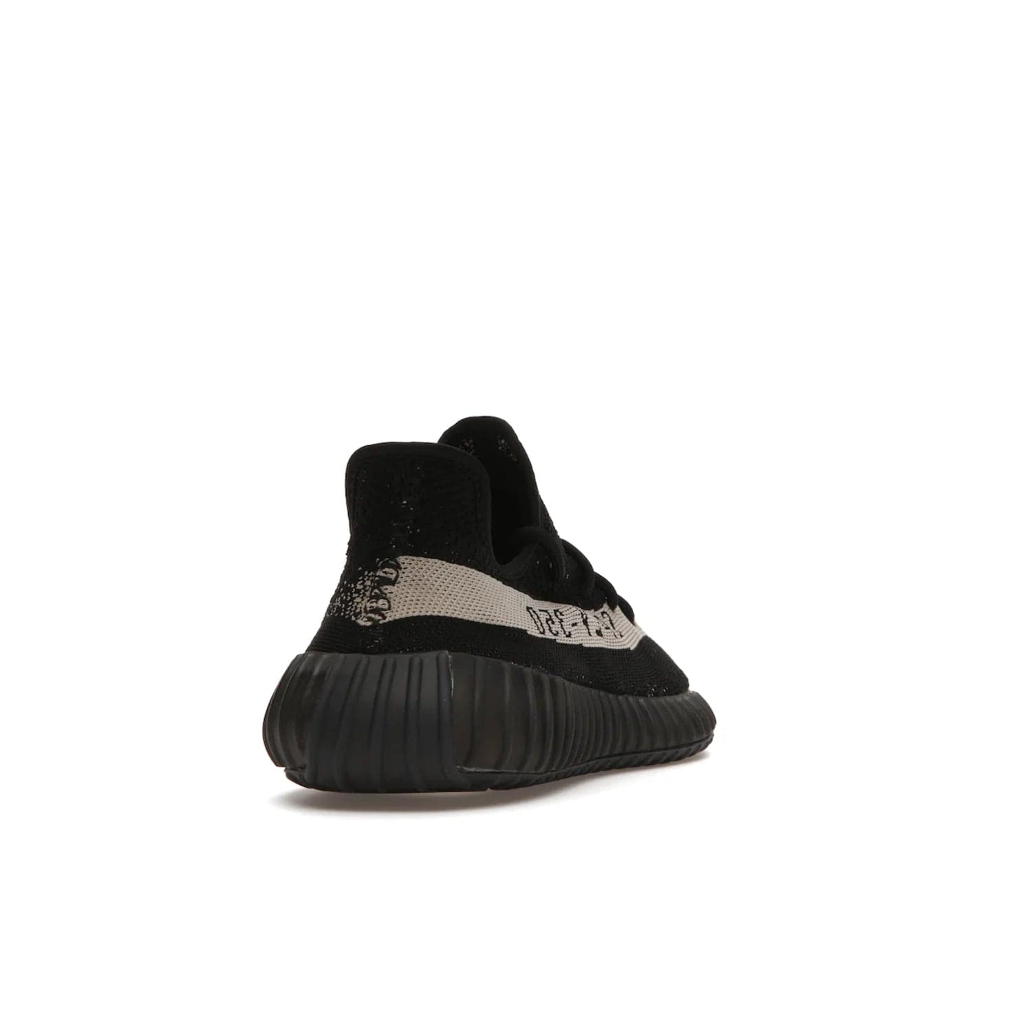 adidas Yeezy Boost 350 V2 Core Black White (2016/2022) - Image 30 - Only at www.BallersClubKickz.com - Stylish adidas Yeezy Boost 350 V2 in classic black with white "SPLY-350" stitched to the side stripe. Features Primeknit upper & Boost sole for comfort. Restock in March 2022.