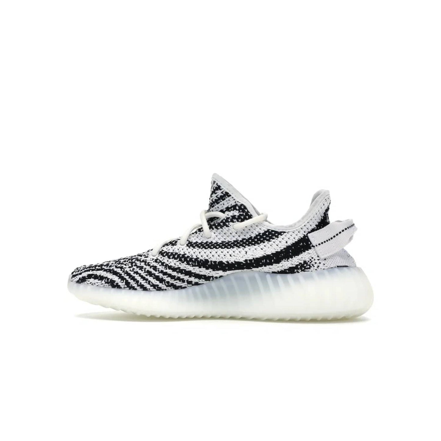 adidas Yeezy Boost 350 V2 Zebra - Image 20 - Only at www.BallersClubKickz.com - #
Score the iconic adidas Yeezy Boost 350 V2 Zebra for a fashionable addition to your street-style. Featuring a Primeknit upper and Boost sole, you'll look great and feel comfortable with every step.