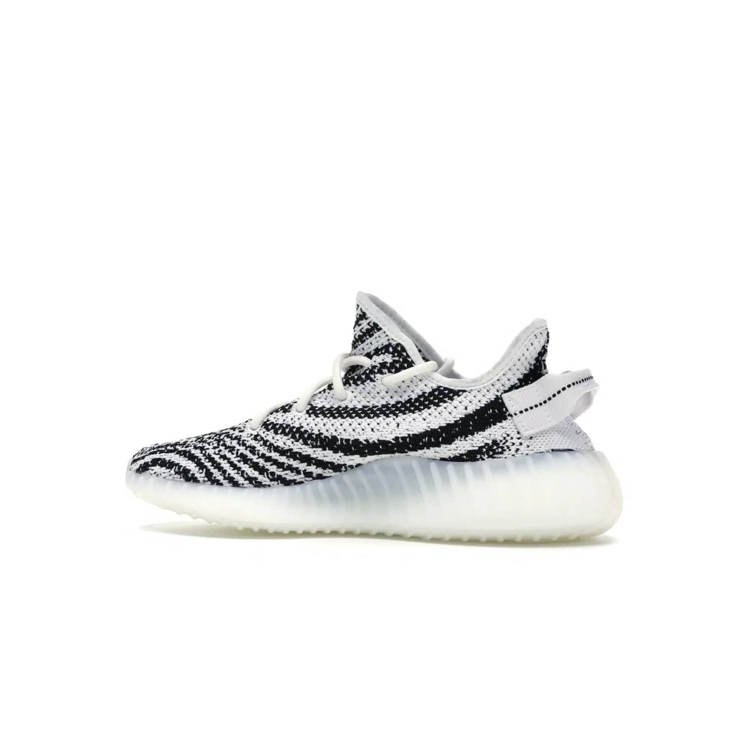 adidas Yeezy Boost 350 V2 Zebra - Image 21 - Only at www.BallersClubKickz.com - #
Score the iconic adidas Yeezy Boost 350 V2 Zebra for a fashionable addition to your street-style. Featuring a Primeknit upper and Boost sole, you'll look great and feel comfortable with every step.