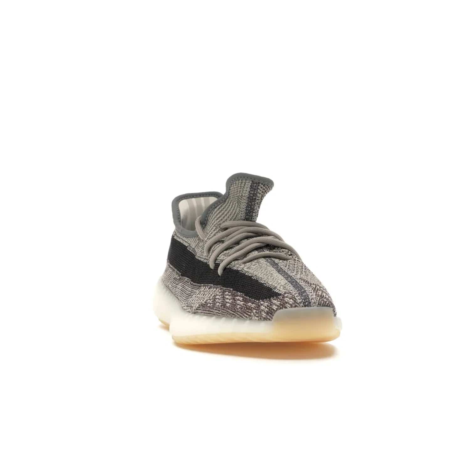 adidas Yeezy Boost 350 V2 Zyon - Image 8 - Only at www.BallersClubKickz.com - Step up your style game with the adidas Yeezy Boost 350 V2 Zyon. This sleek sneaker features a Primeknit upper, dark side stripe, translucent Boost sole, and creamy white interior providing style and comfort. Get them now!