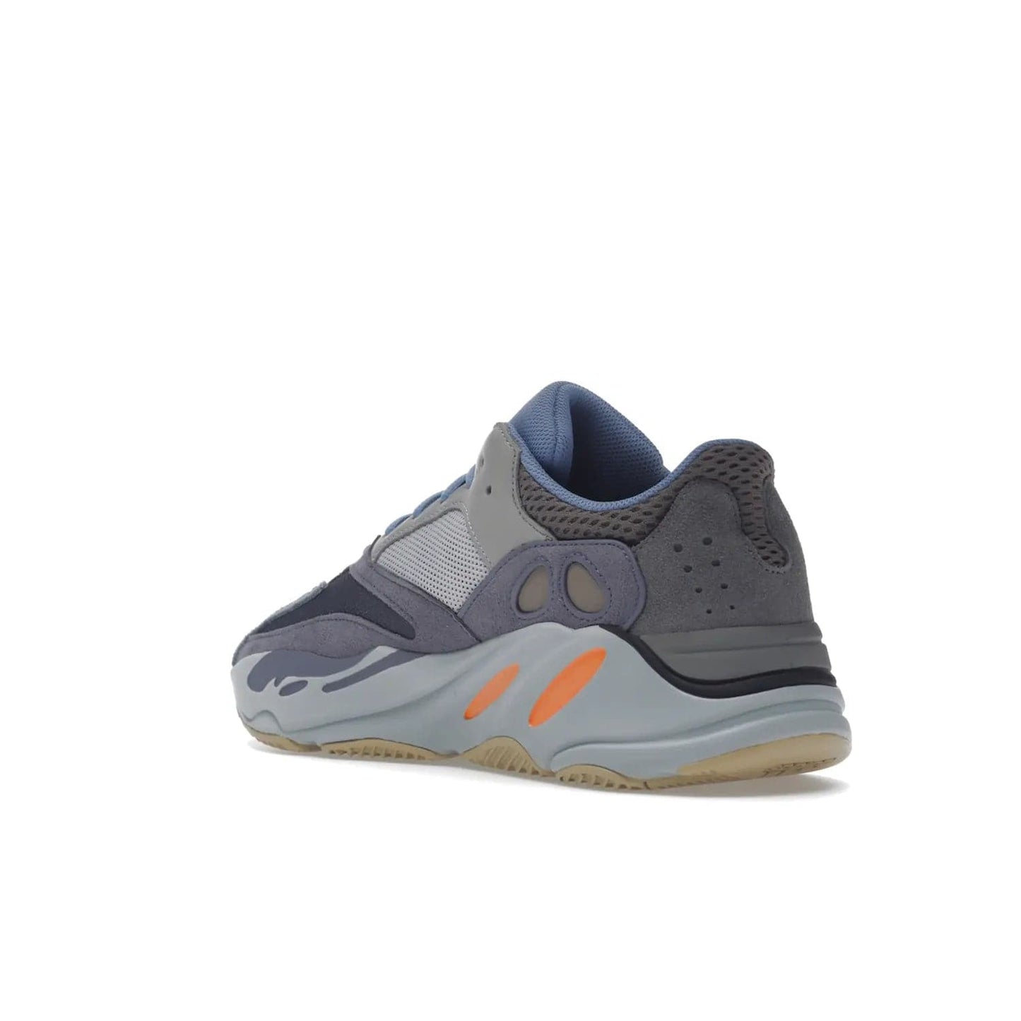 adidas Yeezy Boost 700 Carbon Blue - Image 24 - Only at www.BallersClubKickz.com - Style meets practicality with the adidas Yeezy Boost 700 Carbon Blue. Tonal grey and carbon blue mix of suede and mesh upper, grey midsole and gum outsole. Get yours today.
