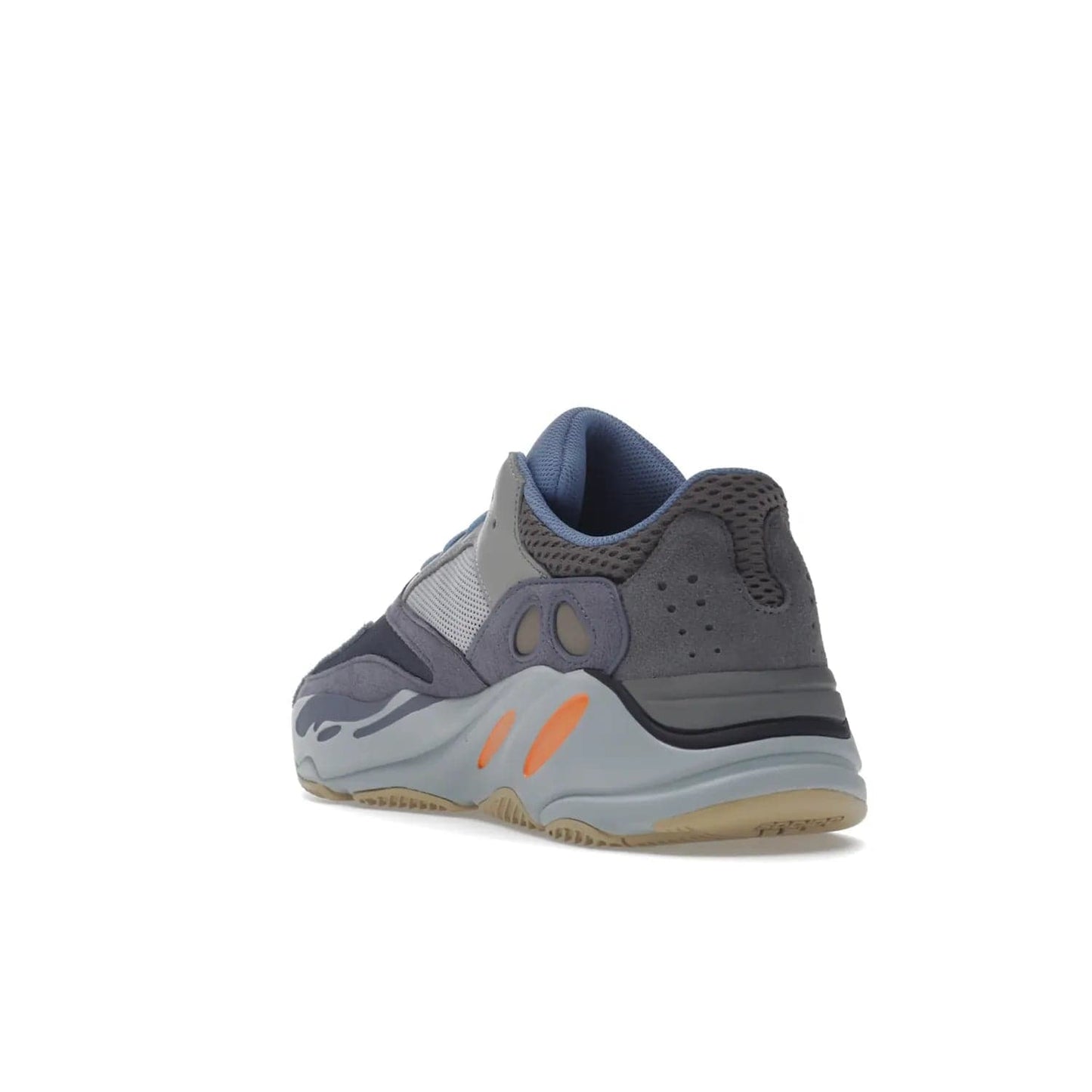 adidas Yeezy Boost 700 Carbon Blue - Image 25 - Only at www.BallersClubKickz.com - Style meets practicality with the adidas Yeezy Boost 700 Carbon Blue. Tonal grey and carbon blue mix of suede and mesh upper, grey midsole and gum outsole. Get yours today.