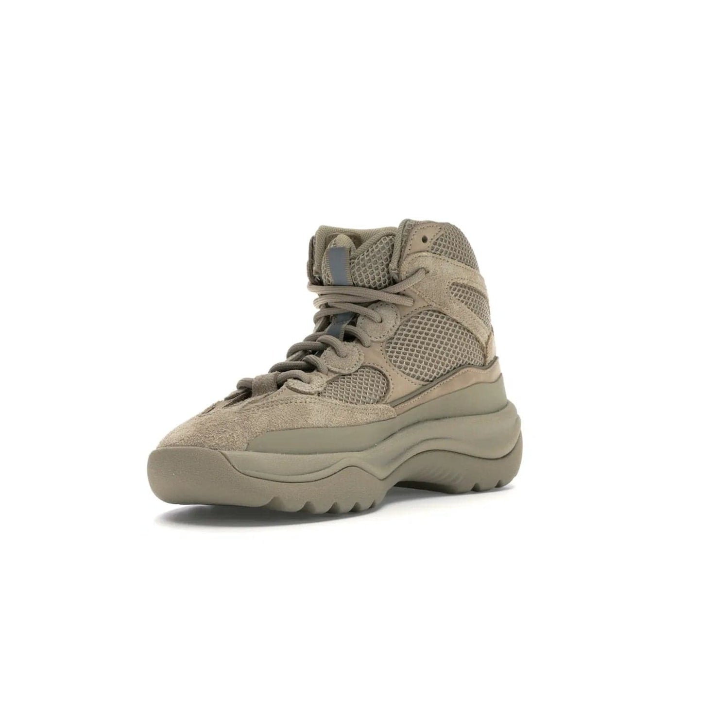adidas Yeezy Desert Boot Rock - Image 14 - Only at www.BallersClubKickz.com - #
This season, make a fashion statement with the adidas Yeezy Desert Boot Rock. Nubuck and suede upper offers tonal style while the grooved sole provides traction and stability. Get yours in April 2019.
