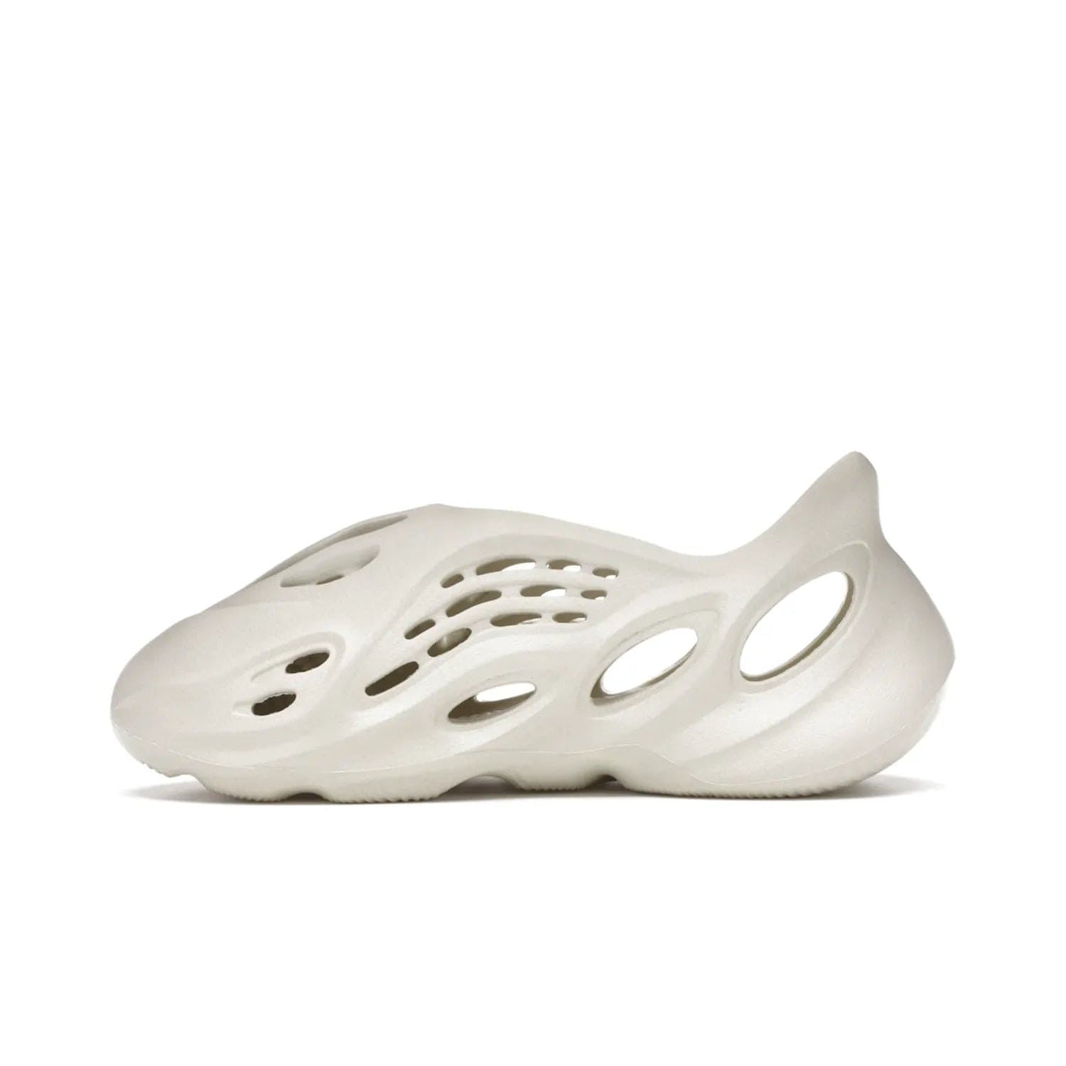 adidas Yeezy Foam RNNR Sand - Image 19 - Only at www.BallersClubKickz.com - Adidas Yeezy Foam RNNR Sand combines style and comfort for the perfect everyday sneaker. Monochromatic Sand upper, foam midsole, rubber outsole, and oval cut-outs for a modern look. Lacing system ensures foot stays secure. Elevate any outfit with style.