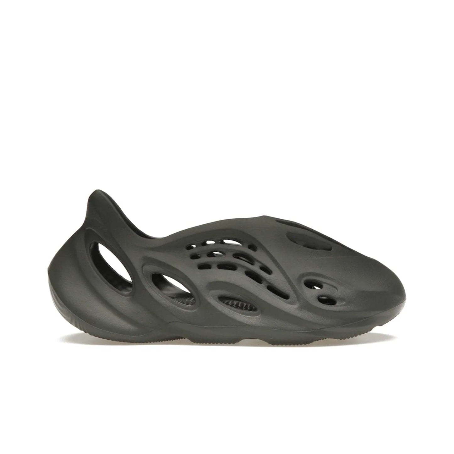 adidas Yeezy Foam RNR Carbon - Image 1 - Only at www.BallersClubKickz.com - Experience truly next-level comfort with the adidas Yeezy Foam RNR Carbon. With its one-piece foam and rubber construction, strategic perforations for optimal breathability, and sleek Carbon colorway, the sneaker is an unrelenting testament to Yeezy innovation. Available August 8, 2023, for $80.
