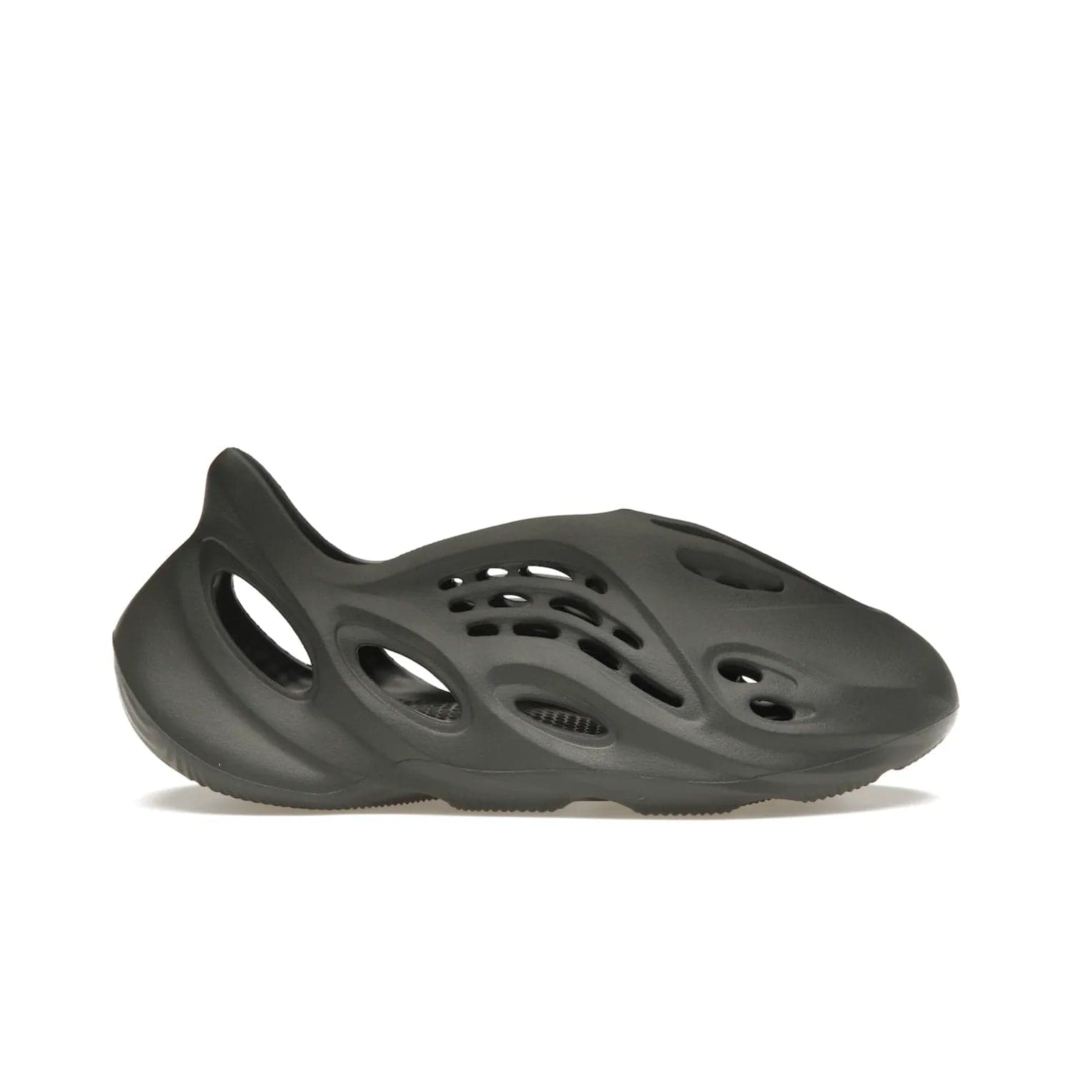 adidas Yeezy Foam RNR Carbon - Image 1 - Only at www.BallersClubKickz.com - Experience truly next-level comfort with the adidas Yeezy Foam RNR Carbon. With its one-piece foam and rubber construction, strategic perforations for optimal breathability, and sleek Carbon colorway, the sneaker is an unrelenting testament to Yeezy innovation. Available August 8, 2023, for $80.