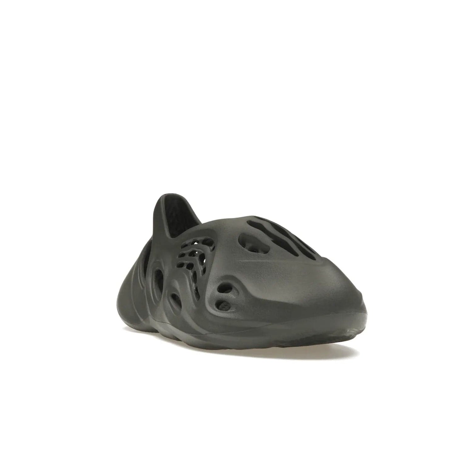 adidas Yeezy Foam RNR Carbon - Image 7 - Only at www.BallersClubKickz.com - Experience truly next-level comfort with the adidas Yeezy Foam RNR Carbon. With its one-piece foam and rubber construction, strategic perforations for optimal breathability, and sleek Carbon colorway, the sneaker is an unrelenting testament to Yeezy innovation. Available August 8, 2023, for $80.