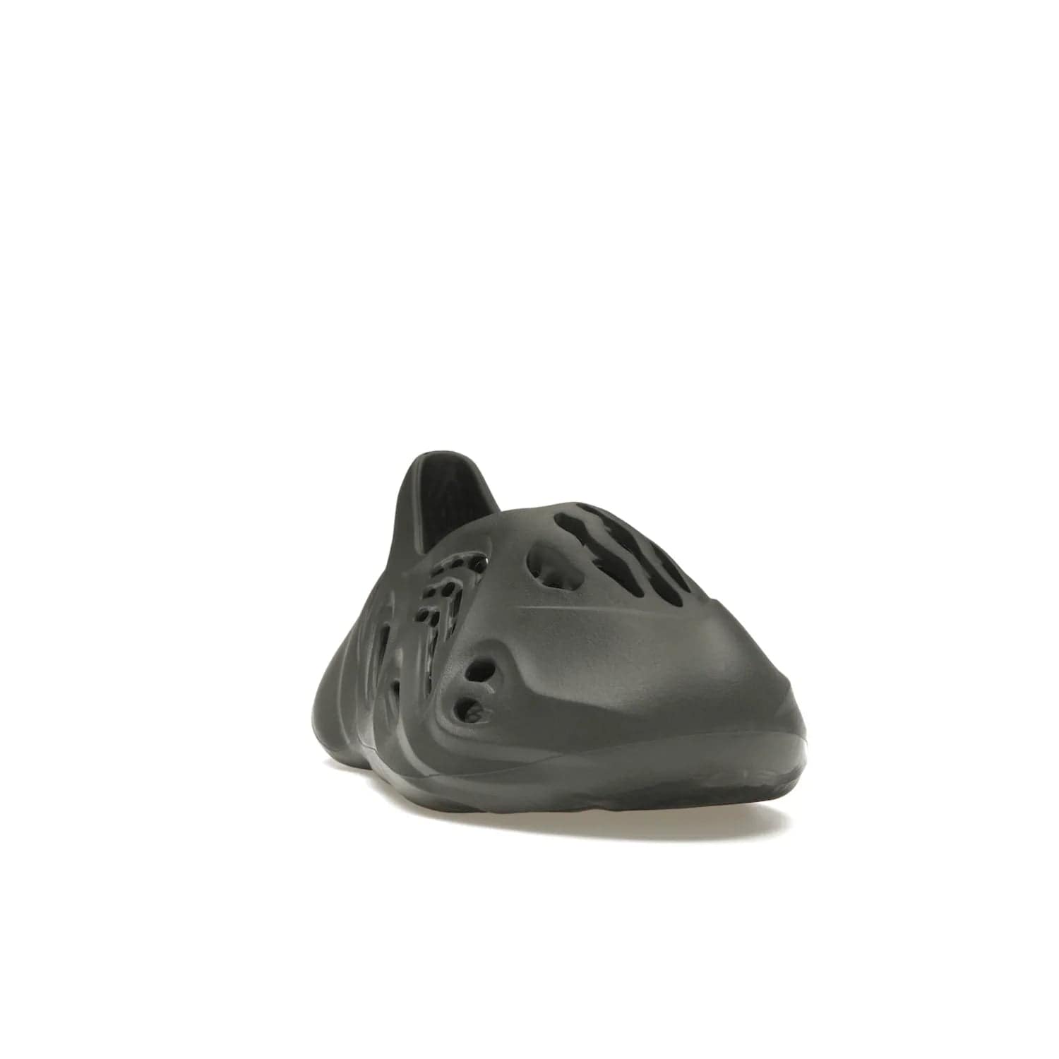 adidas Yeezy Foam RNR Carbon - Image 8 - Only at www.BallersClubKickz.com - Experience truly next-level comfort with the adidas Yeezy Foam RNR Carbon. With its one-piece foam and rubber construction, strategic perforations for optimal breathability, and sleek Carbon colorway, the sneaker is an unrelenting testament to Yeezy innovation. Available August 8, 2023, for $80.